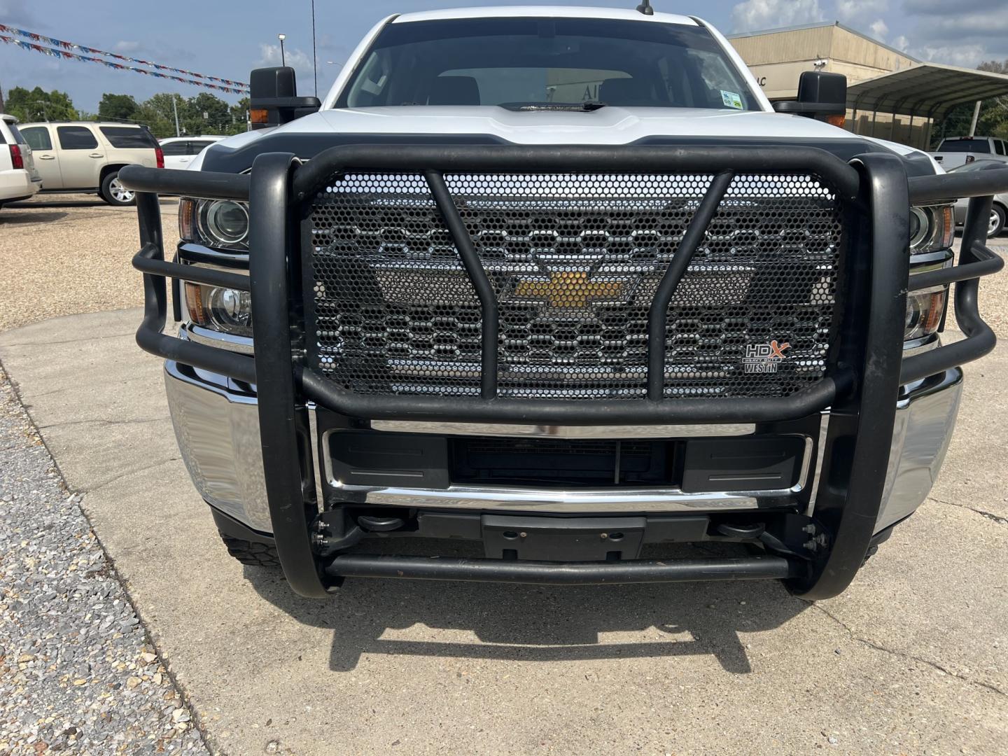 2019 White /Gray Chevrolet Silverado 2500HD Work Truck (1GC1KREG1KF) with an 6.0L V8 engine, 6-Speed Automatic transmission, located at 4520 Airline Hwy, Baton Rouge, LA, 70805, (225) 357-1497, 30.509325, -91.145432 - 2019 Chevrolet Silverado 2500HD Crew Cab 4X4 **NO ACCIDENTS** 6.0 V8 Gas, 197K Miles, Cold A/C, Power Seat, Windows, Locks & Mirrors, Backup Camera, Spray In Bedliner, Good Tires, Tow Package. FOR INFO PLEASE CONTACT JEFF AT 225-413-0981. CHECK OUT OUR A+ RATING WITH THE BETTER BUSINESS BUREAU. WE- Photo#2