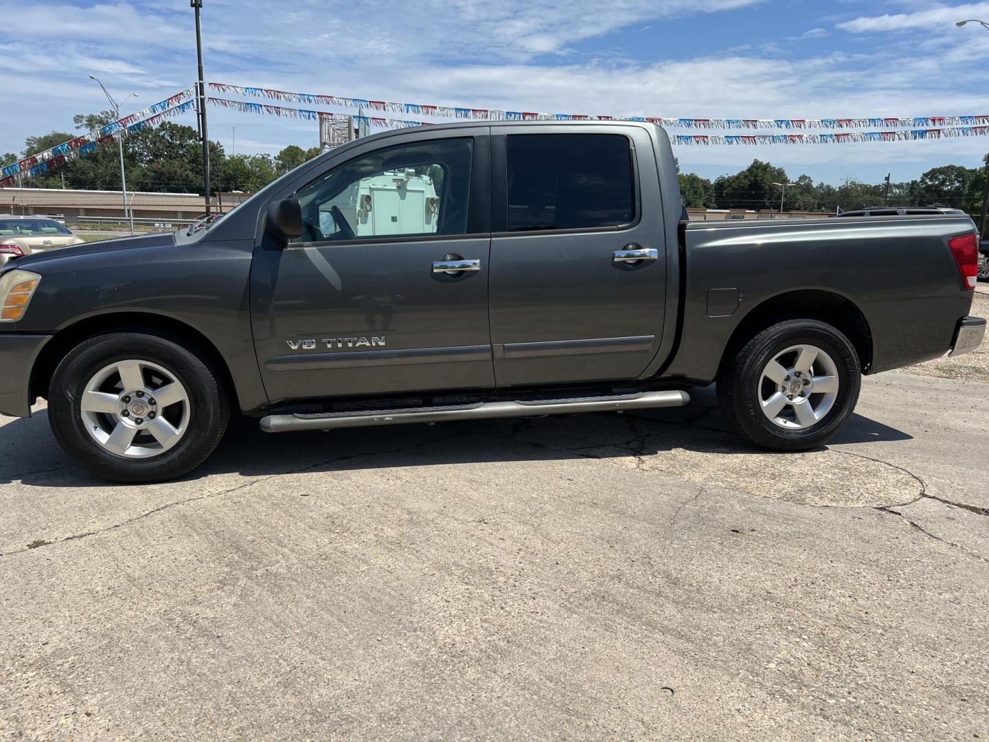 2006 Dark Gray /Gray Nissan Titan SE (1N6BA07AX6N) with an 5.6L V8 DOHC 32V FFV engine, 5-Speed Automatic Overdrive transmission, located at 4520 Airline Hwy, Baton Rouge, LA, 70805, (225) 357-1497, 30.509325, -91.145432 - 2006 Nissan Titan Crew Cab SE 5.6 V8 Gas, 245K Miles, A/C, Power Windows & Locks. FOR INFO PLEASE CONTACT JEFF AT 225-413-0981 CHECK OUT OUR A+ RATING WITH THE BETTER BUSINESS BUREAU WE HAVE BEEN A FAMILY OWNED AND OPERATED BUSINESS AT THE SAME LOCATION FOR OVER 45 YEARS. WE STRIVE TO KEEP CUSTOME - Photo#1