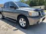 2006 Dark Gray /Gray Nissan Titan SE (1N6BA07AX6N) with an 5.6L V8 DOHC 32V FFV engine, 5-Speed Automatic Overdrive transmission, located at 4520 Airline Hwy, Baton Rouge, LA, 70805, (225) 357-1497, 30.509325, -91.145432 - 2006 Nissan Titan Crew Cab SE 5.6 V8 Gas, 245K Miles, A/C, Power Windows & Locks. FOR INFO PLEASE CONTACT JEFF AT 225-413-0981 CHECK OUT OUR A+ RATING WITH THE BETTER BUSINESS BUREAU WE HAVE BEEN A FAMILY OWNED AND OPERATED BUSINESS AT THE SAME LOCATION FOR OVER 45 YEARS. WE STRIVE TO KEEP CUSTOME - Photo#3