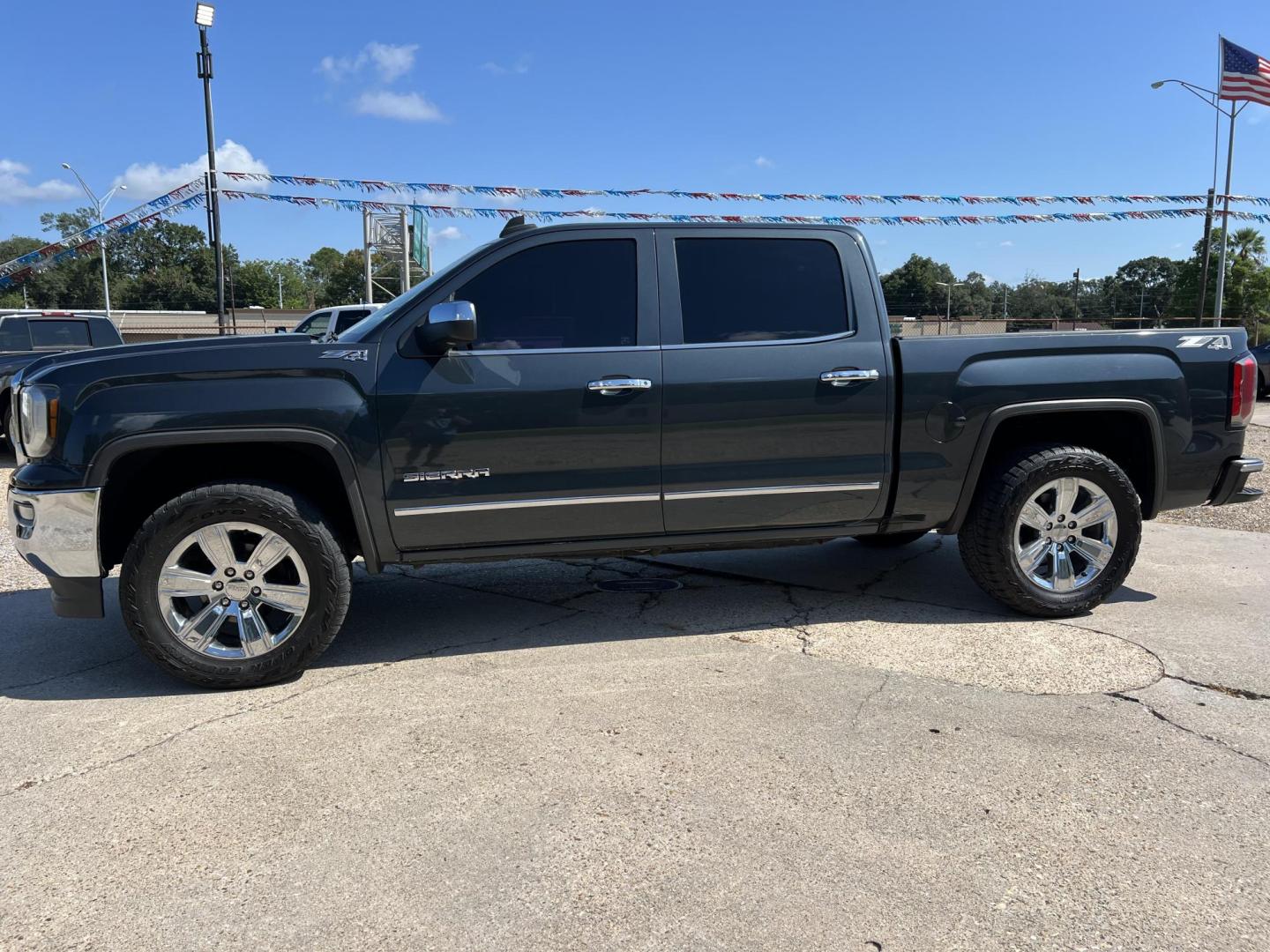 2017 Dark Gray /Black GMC Sierra 1500 SLT (3GTU2NEC6HG) with an 5.3L V8 OHV 16V engine, 6-Speed Automatic transmission, located at 4520 Airline Hwy, Baton Rouge, LA, 70805, (225) 357-1497, 30.509325, -91.145432 - 2017 GMC Sierra 1500 Crew Cab SLT 4X4 ***ONE OWNER*** 5.3 V8 Gas, 167K Miles, Heated & Cooled Leather, All Power, Cold A/C, Power Windows, Locks & Mirrors, Backup Camera, Tow Package. Has Some Minor Dings. FOR INFO PLEASE CONTACT JEFF AT 225-413-0981 CHECK OUT OUR A+ RATING WITH THE BETTER BUSINES - Photo#1