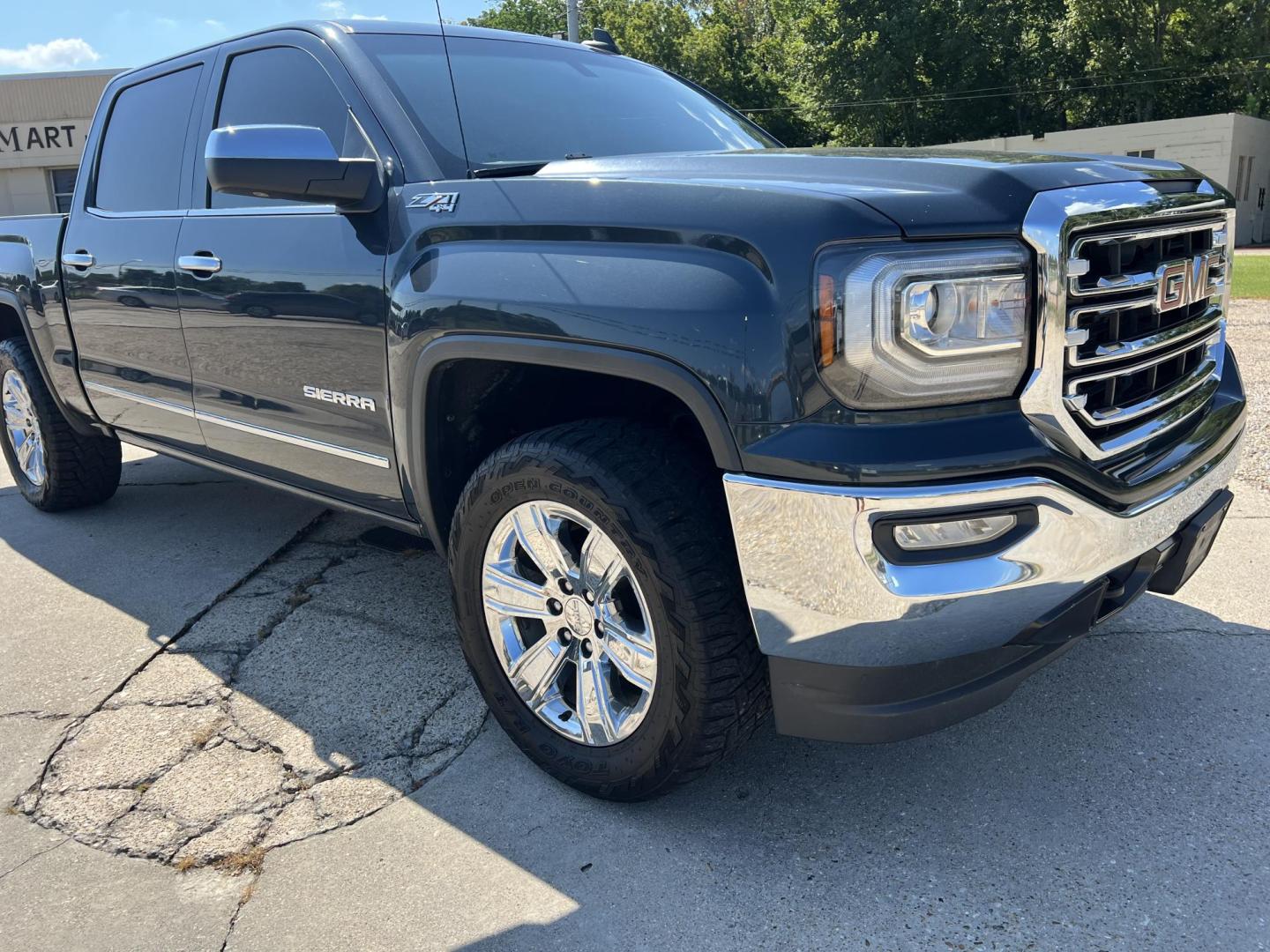2017 Dark Gray /Black GMC Sierra 1500 SLT (3GTU2NEC6HG) with an 5.3L V8 OHV 16V engine, 6-Speed Automatic transmission, located at 4520 Airline Hwy, Baton Rouge, LA, 70805, (225) 357-1497, 30.509325, -91.145432 - 2017 GMC Sierra 1500 Crew Cab SLT 4X4 ***ONE OWNER*** 5.3 V8 Gas, 167K Miles, Heated & Cooled Leather, All Power, Cold A/C, Power Windows, Locks & Mirrors, Backup Camera, Tow Package. Has Some Minor Dings. FOR INFO PLEASE CONTACT JEFF AT 225-413-0981 CHECK OUT OUR A+ RATING WITH THE BETTER BUSINES - Photo#3