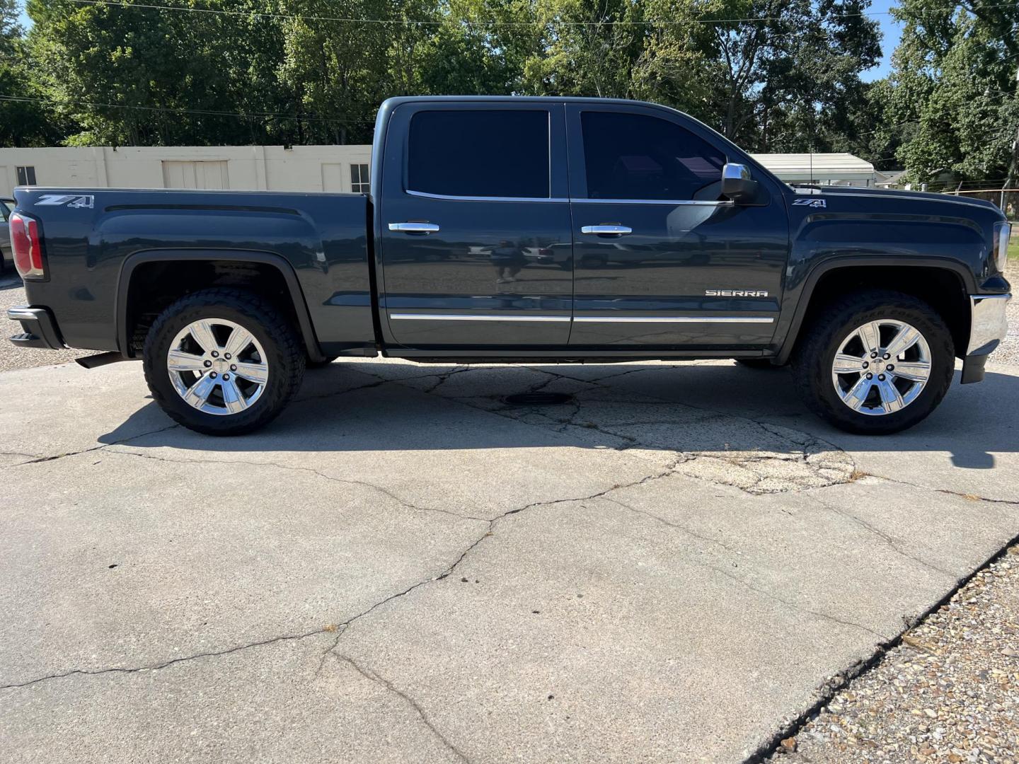 2017 Dark Gray /Black GMC Sierra 1500 SLT (3GTU2NEC6HG) with an 5.3L V8 OHV 16V engine, 6-Speed Automatic transmission, located at 4520 Airline Hwy, Baton Rouge, LA, 70805, (225) 357-1497, 30.509325, -91.145432 - 2017 GMC Sierra 1500 Crew Cab SLT 4X4 ***ONE OWNER*** 5.3 V8 Gas, 167K Miles, Heated & Cooled Leather, All Power, Cold A/C, Power Windows, Locks & Mirrors, Backup Camera, Tow Package. Has Some Minor Dings. FOR INFO PLEASE CONTACT JEFF AT 225-413-0981 CHECK OUT OUR A+ RATING WITH THE BETTER BUSINES - Photo#4