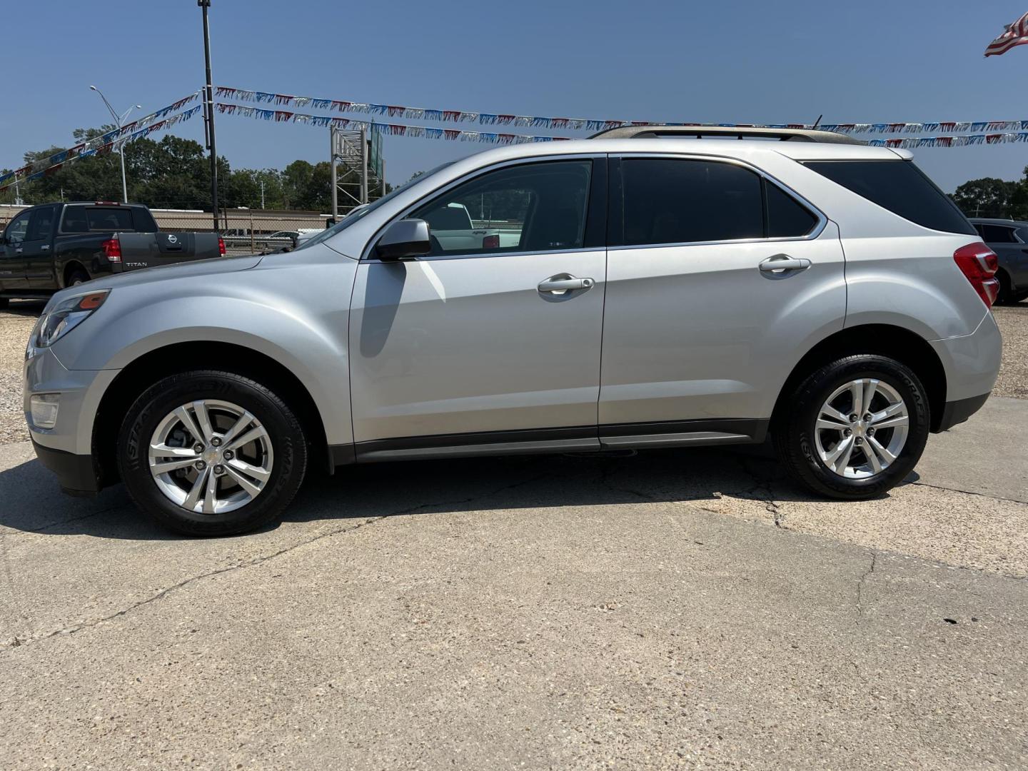 2016 Silver /Black Chevrolet Equinox LT (2GNALCEK7G6) with an 2.4L L4 DOHC 16V FFV engine, 6-Speed Automatic transmission, located at 4520 Airline Hwy, Baton Rouge, LA, 70805, (225) 357-1497, 30.509325, -91.145432 - 2016 Chevrolet Equinox LT 2.4L 4 Cylinder Gas, **ONLY 72K Miles** Cold A/C, Power Windows, Locks & Mirrors, Backup Camera And More. FOR INFO PLEASE CONTACT JEFF AT 225-413-0981 CHECK OUT OUR A+ RATING WITH THE BETTER BUSINESS BUREAU WE HAVE BEEN A FAMILY OWNED AND OPERATED BUSINESS AT THE SAME LOCAT - Photo#1