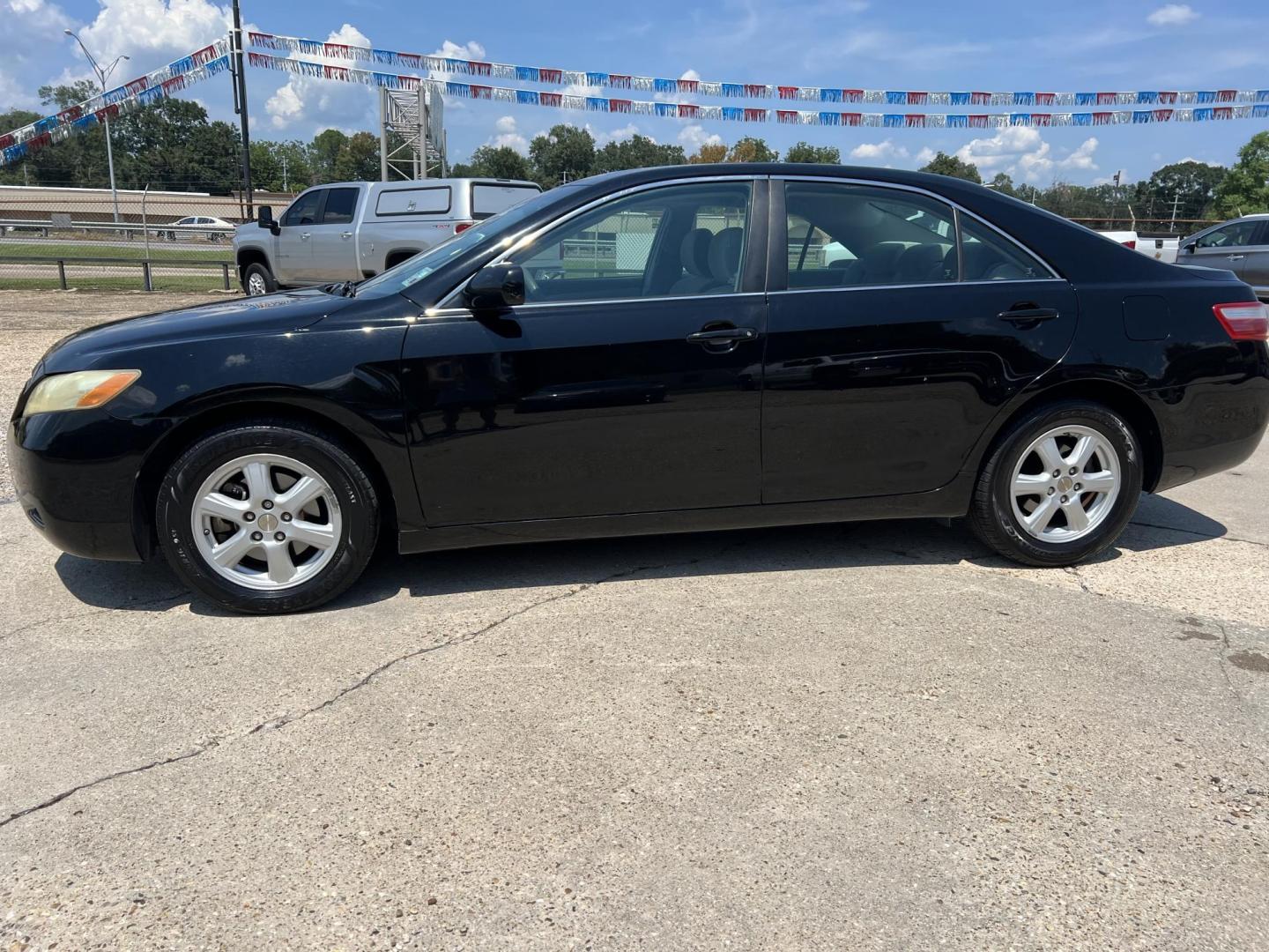 2008 Black /Gray Toyota Camry LE (4T4BE46K08R) with an 2.4L L4 DOHC 16V engine, 5-Speed Automatic Overdrive transmission, located at 4520 Airline Hwy, Baton Rouge, LA, 70805, (225) 357-1497, 30.509325, -91.145432 - 2008 Toyota Camry LE **One Owner** 4 Cylinder Gas, Cold A/C, Power Windows, Locks & Mirrors. FOR INFO PLEASE CONTACT JEFF AT 225-413-0981 CHECK OUT OUR A+ RATING WITH THE BETTER BUSINESS BUREAU WE HAVE BEEN A FAMILY OWNED AND OPERATED BUSINESS AT THE SAME LOCATION FOR OVER 48 YEARS. WE STRIVE TO K - Photo#1
