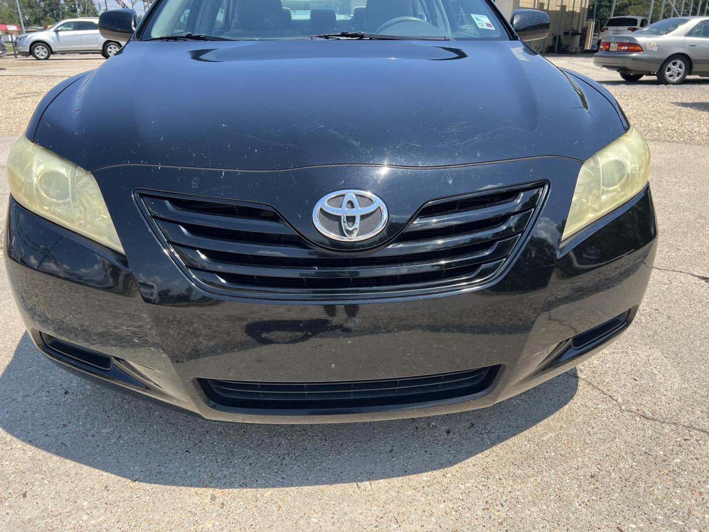 2008 Black /Gray Toyota Camry LE (4T4BE46K08R) with an 2.4L L4 DOHC 16V engine, 5-Speed Automatic Overdrive transmission, located at 4520 Airline Hwy, Baton Rouge, LA, 70805, (225) 357-1497, 30.509325, -91.145432 - 2008 Toyota Camry LE **One Owner** 4 Cylinder Gas, Cold A/C, Power Windows, Locks & Mirrors. FOR INFO PLEASE CONTACT JEFF AT 225-413-0981 CHECK OUT OUR A+ RATING WITH THE BETTER BUSINESS BUREAU WE HAVE BEEN A FAMILY OWNED AND OPERATED BUSINESS AT THE SAME LOCATION FOR OVER 48 YEARS. WE STRIVE TO K - Photo#2