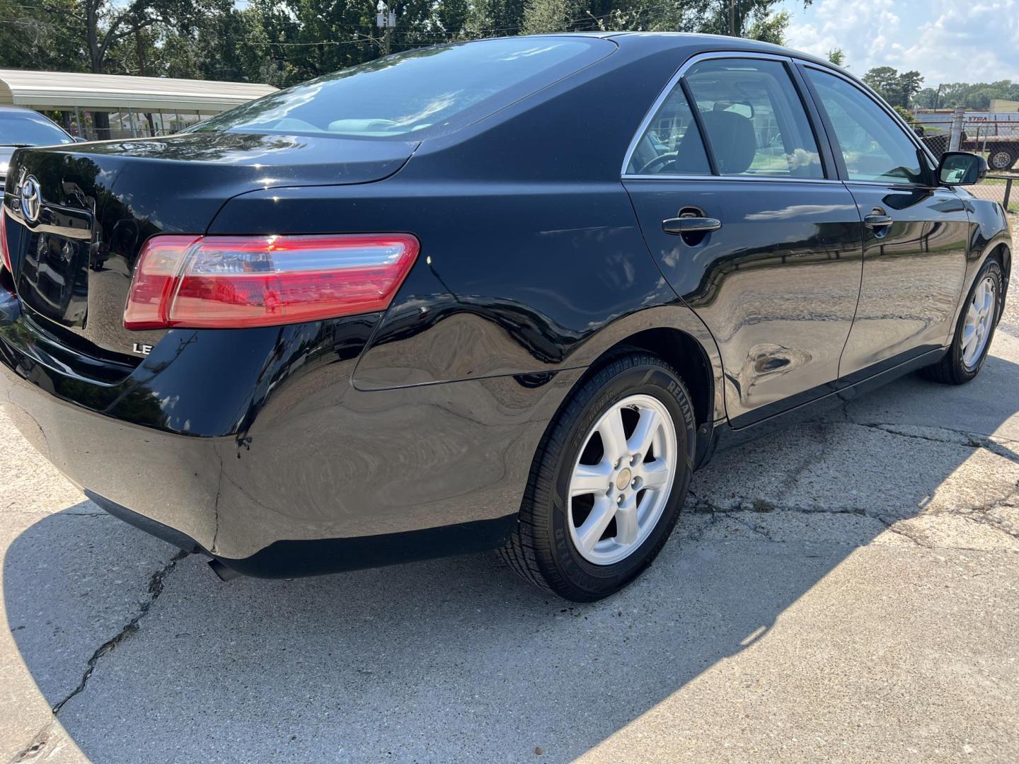2008 Black /Gray Toyota Camry LE (4T4BE46K08R) with an 2.4L L4 DOHC 16V engine, 5-Speed Automatic Overdrive transmission, located at 4520 Airline Hwy, Baton Rouge, LA, 70805, (225) 357-1497, 30.509325, -91.145432 - 2008 Toyota Camry LE **One Owner** 4 Cylinder Gas, Cold A/C, Power Windows, Locks & Mirrors. FOR INFO PLEASE CONTACT JEFF AT 225-413-0981 CHECK OUT OUR A+ RATING WITH THE BETTER BUSINESS BUREAU WE HAVE BEEN A FAMILY OWNED AND OPERATED BUSINESS AT THE SAME LOCATION FOR OVER 48 YEARS. WE STRIVE TO K - Photo#5