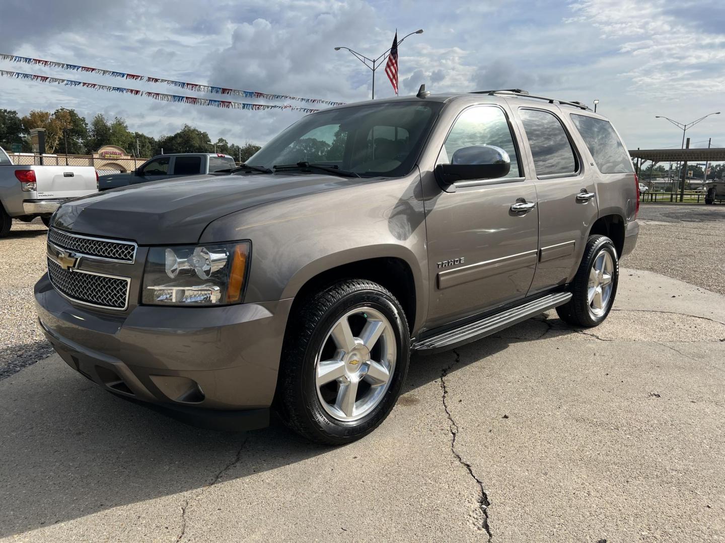 2013 Brown /Tan Chevrolet Tahoe LT (1GNSCBE0XDR) with an 5.3L V8 OHV 16V FFV engine, 6-Speed Automatic transmission, located at 4520 Airline Hwy, Baton Rouge, LA, 70805, (225) 357-1497, 30.509325, -91.145432 - 2013 Chevrolet Tahoe LT 2WD 5.3 V8 Gas, 141K Miles, Heated Leather, Seating For 7, Cold A/C, All Power, Backup Camera, 20 Inch Factory Alloy Wheels, Tow Package. FOR INFO PLEASE CONTACT JEFF AT 225-413-0981 CHECK OUT OUR A+ RATING WITH THE BETTER BUSINESS BUREAU WE HAVE BEEN A FAMILY-OWNED AND OP - Photo#0