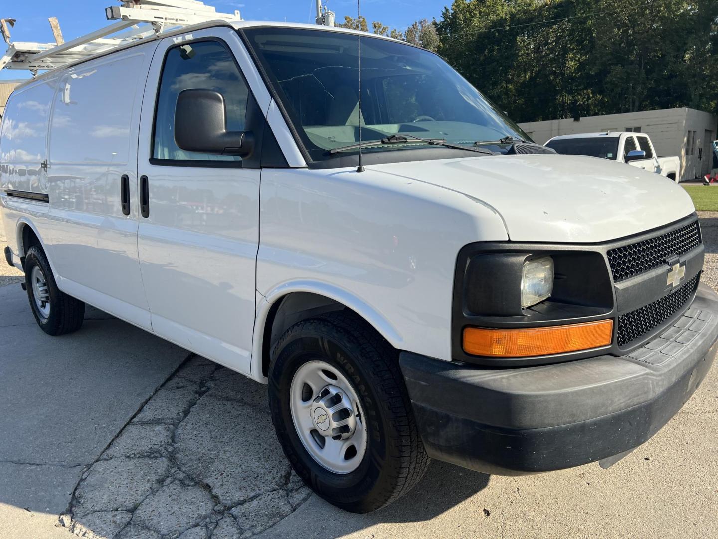 2013 White /Gray Chevrolet Express (1GCWGFCA7D1) with an 4.8L V8 OHV 16V FFV engine, 6-Speed Automatic transmission, located at 4520 Airline Hwy, Baton Rouge, LA, 70805, (225) 357-1497, 30.509325, -91.145432 - 2013 Chevrolet Express 2500 Cargo Van 4.8 V8 Gas, 169K Miles, Cold A/C, Power Windows, Locks & Mirrors, Has Minor Dings & Scratches. FOR INFO PLEASE CONTACT JEFF AT 225-413-0981 CHECK OUT OUR A+ RATING WITH THE BETTER BUSINESS BUREAU WE HAVE BEEN A FAMILY OWNED AND OPERATED BUSINESS AT THE SAME LOCA - Photo#3