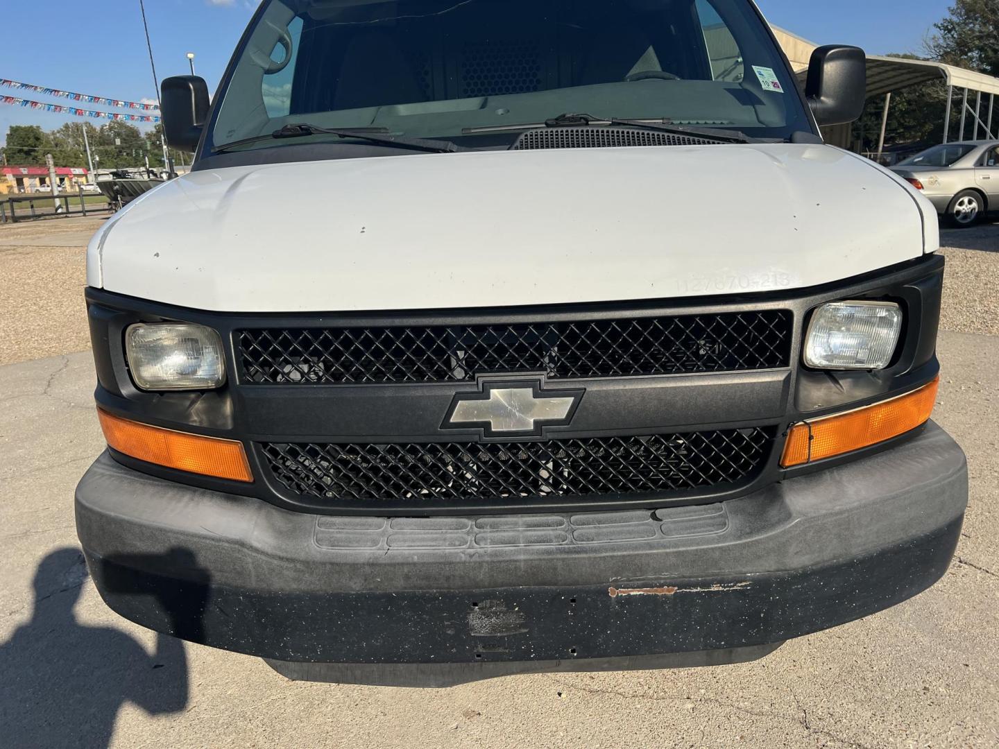 2013 White /Gray Chevrolet Express (1GCWGFCA7D1) with an 4.8L V8 OHV 16V FFV engine, 6-Speed Automatic transmission, located at 4520 Airline Hwy, Baton Rouge, LA, 70805, (225) 357-1497, 30.509325, -91.145432 - 2013 Chevrolet Express 2500 Cargo Van 4.8 V8 Gas, 169K Miles, Cold A/C, Power Windows, Locks & Mirrors, Has Minor Dings & Scratches. FOR INFO PLEASE CONTACT JEFF AT 225-413-0981 CHECK OUT OUR A+ RATING WITH THE BETTER BUSINESS BUREAU WE HAVE BEEN A FAMILY OWNED AND OPERATED BUSINESS AT THE SAME LOCA - Photo#2