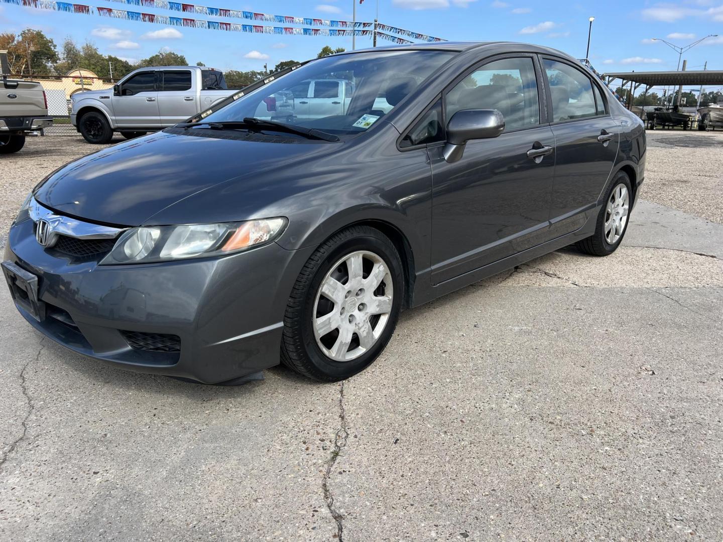 2011 Gray /Gray Honda Civic LX (2HGFA1F59BH) with an 1.8L L4 SOHC 16V engine, 5-Speed Automatic transmission, located at 4520 Airline Hwy, Baton Rouge, LA, 70805, (225) 357-1497, 30.509325, -91.145432 - 2011 Honda Civic LX ***ONE OWNER & NO ACCIDENTS*** 1.8 4 Cylinder Gas Saver, 104K Miles, A/C & Heat, Power Windows, Locks & Mirrors. FOR INFO PLEASE CONTACT JEFF AT 225-413-0981 CHECK OUT OUR A+ RATING WITH THE BETTER BUSINESS BUREAU WE HAVE BEEN A FAMILY OWNED AND OPERATED BUSINESS AT THE SAME LO - Photo#0