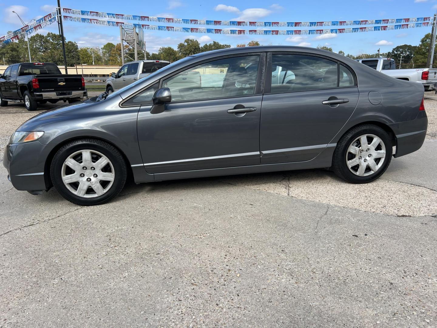 2011 Gray /Gray Honda Civic LX (2HGFA1F59BH) with an 1.8L L4 SOHC 16V engine, 5-Speed Automatic transmission, located at 4520 Airline Hwy, Baton Rouge, LA, 70805, (225) 357-1497, 30.509325, -91.145432 - 2011 Honda Civic LX ***ONE OWNER & NO ACCIDENTS*** 1.8 4 Cylinder Gas Saver, 104K Miles, A/C & Heat, Power Windows, Locks & Mirrors. FOR INFO PLEASE CONTACT JEFF AT 225-413-0981 CHECK OUT OUR A+ RATING WITH THE BETTER BUSINESS BUREAU WE HAVE BEEN A FAMILY OWNED AND OPERATED BUSINESS AT THE SAME LO - Photo#1