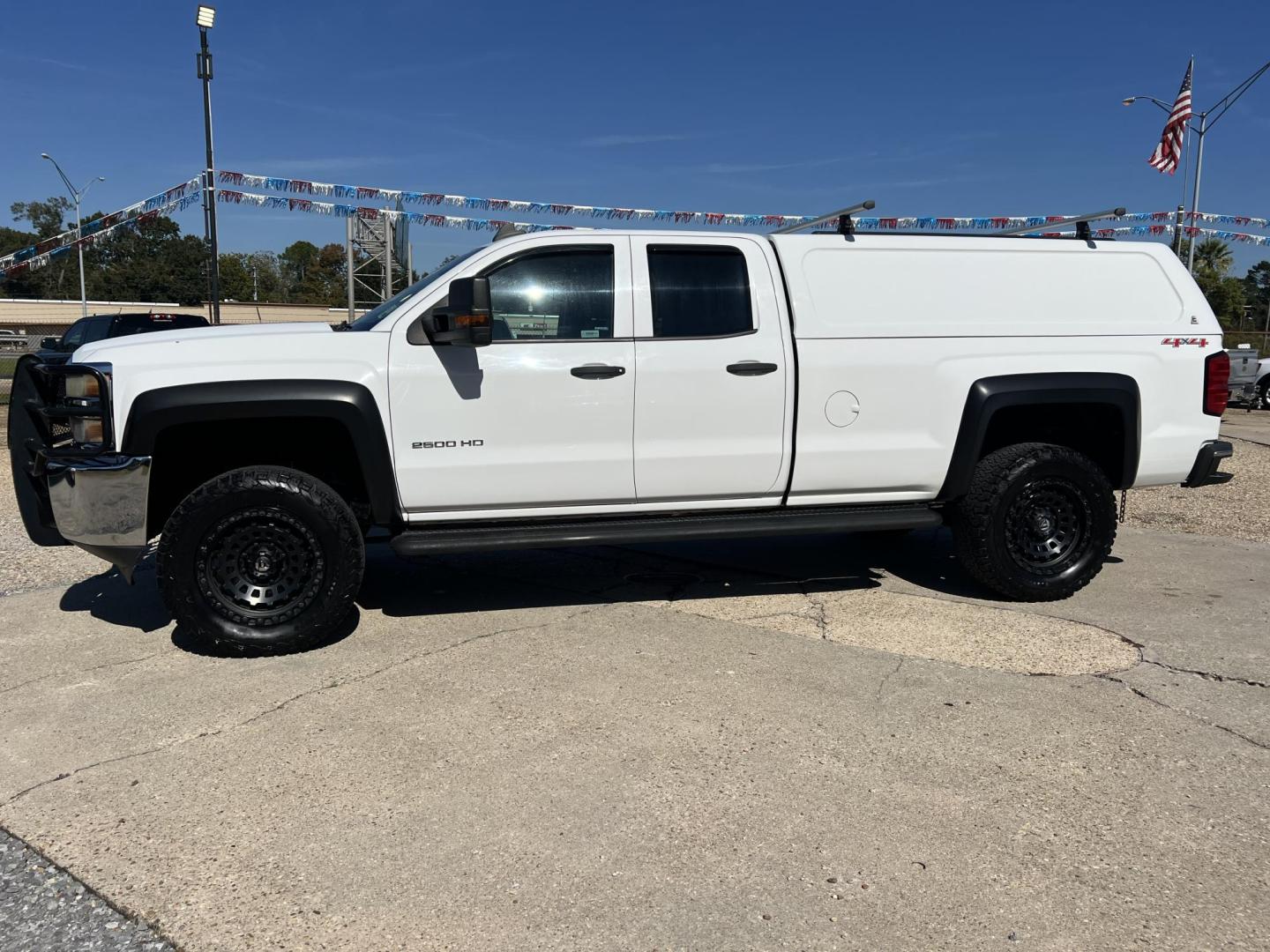 2015 White /Gray Chevrolet Silverado 2500HD (1GC2KUEG1FZ) with an 6.0L V8 OHV 16V FFV engine, 6-Speed Automatic transmission, located at 4520 Airline Hwy, Baton Rouge, LA, 70805, (225) 357-1497, 30.509325, -91.145432 - 2015 Chevrolet Silverado 2500HD Double Cab 4X4 ***ONE OWNER*** 6.0 V8 Gas, 260K Miles, A/C & Heat, Power Windows, Locks & Mirrors, Backup Camera, Spray In Bedliner, Century Camper Shell, Tow Package, Fuel Wheels. FOR INFO PLEASE CONTACT JEFF AT 225-413-0981 CHECK OUT OUR A+ RATING WITH THE BETTER BU - Photo#1
