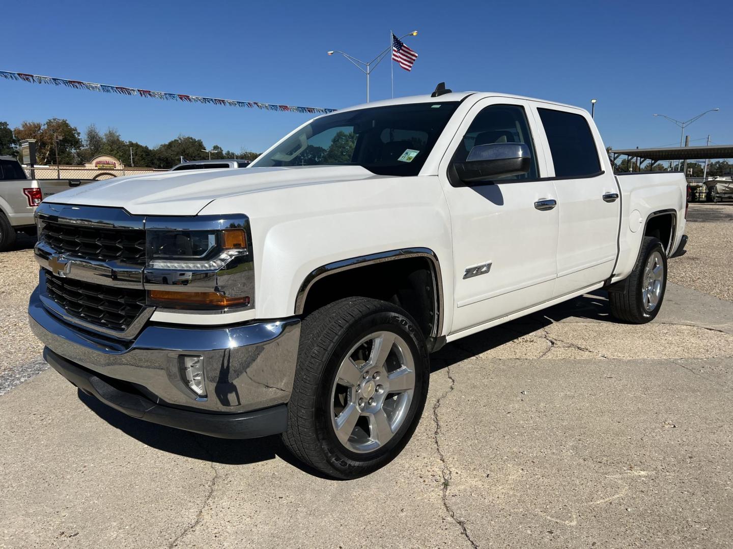 2018 White /Tan Chevrolet Silverado 1500 LT (3GCPCREC7JG) with an 5.3L V8 OHV 16V engine, 6-Speed Automatic transmission, located at 4520 Airline Hwy, Baton Rouge, LA, 70805, (225) 357-1497, 30.509325, -91.145432 - 2018 Chevrolet Silverado 1500 Crew Cab LT 5.3 V8 Gas, 114K Miles, Heated Leather, Cold A/C, Power Seat, Windows, Locks & Mirrors, Bose Stereo, Backup Camera, Tow Package. Has Minor Ding On RR Corner. FOR INFO PLEASE CONTACT JEFF AT 225-413-0981 CHECK OUT OUR A+ RATING WITH THE BETTER BUSINESS BUREAU - Photo#0