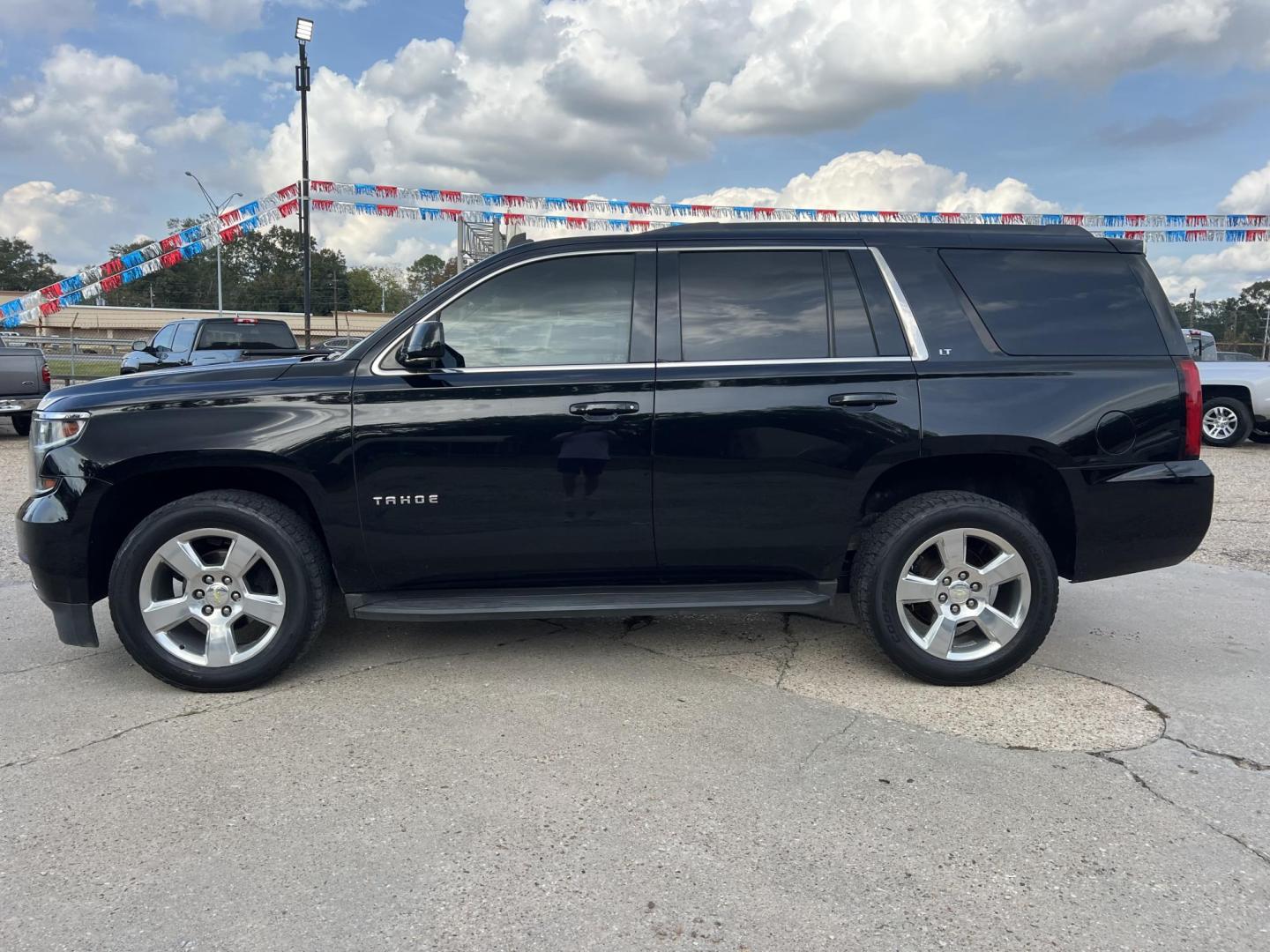 2015 Black /Black Chevrolet Tahoe LT (1GNSCBKC6FR) with an 5.3L V8 engine, 6-Speed Automatic transmission, located at 4520 Airline Hwy, Baton Rouge, LA, 70805, (225) 357-1497, 30.509325, -91.145432 - 2015 Chevrolet Tahoe LT 2WD 5.3 V8 Gas, 165K Miles, Heated Leather, Seat 8, Dual A/C & Heat, All Power, Bose Stereo, Navigation, Backup Camera, Tow Package. FOR INFO PLEASE CONTACT JEFF AT 225-413-0981 CHECK OUT OUR A+ RATING WITH THE BETTER BUSINESS BUREAU WE HAVE BEEN A FAMILY OWNED AND OPERAT - Photo#1