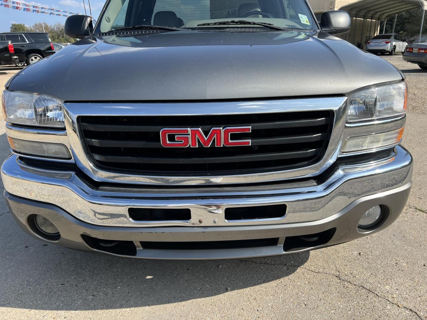 2007 Gray /Gray GMC Sierra Classic 1500 SLT (1GTEC19Z87Z) with an 5.3L V8 engine, 4-Speed Automatic Overdrive transmission, located at 4520 Airline Hwy, Baton Rouge, LA, 70805, (225) 357-1497, 30.509325, -91.145432 - 2007 GMC Sierra 1500 Classic Ext Cab SLT ***TWO OWNER & NO ACCIDENTS*** 5.3 V8 Gas, 197K Miles, Heated Leather, Full Console, Cold A/C, Power Seat, Windows, Locks & Mirrors, Spray In Bedliner, Tow Package. FOR INFO PLEASE CONTACT JEFF AT 225-413-0981. CHECK OUT OUR A+ RATING WITH THE BETTER BUSINESS - Photo#2