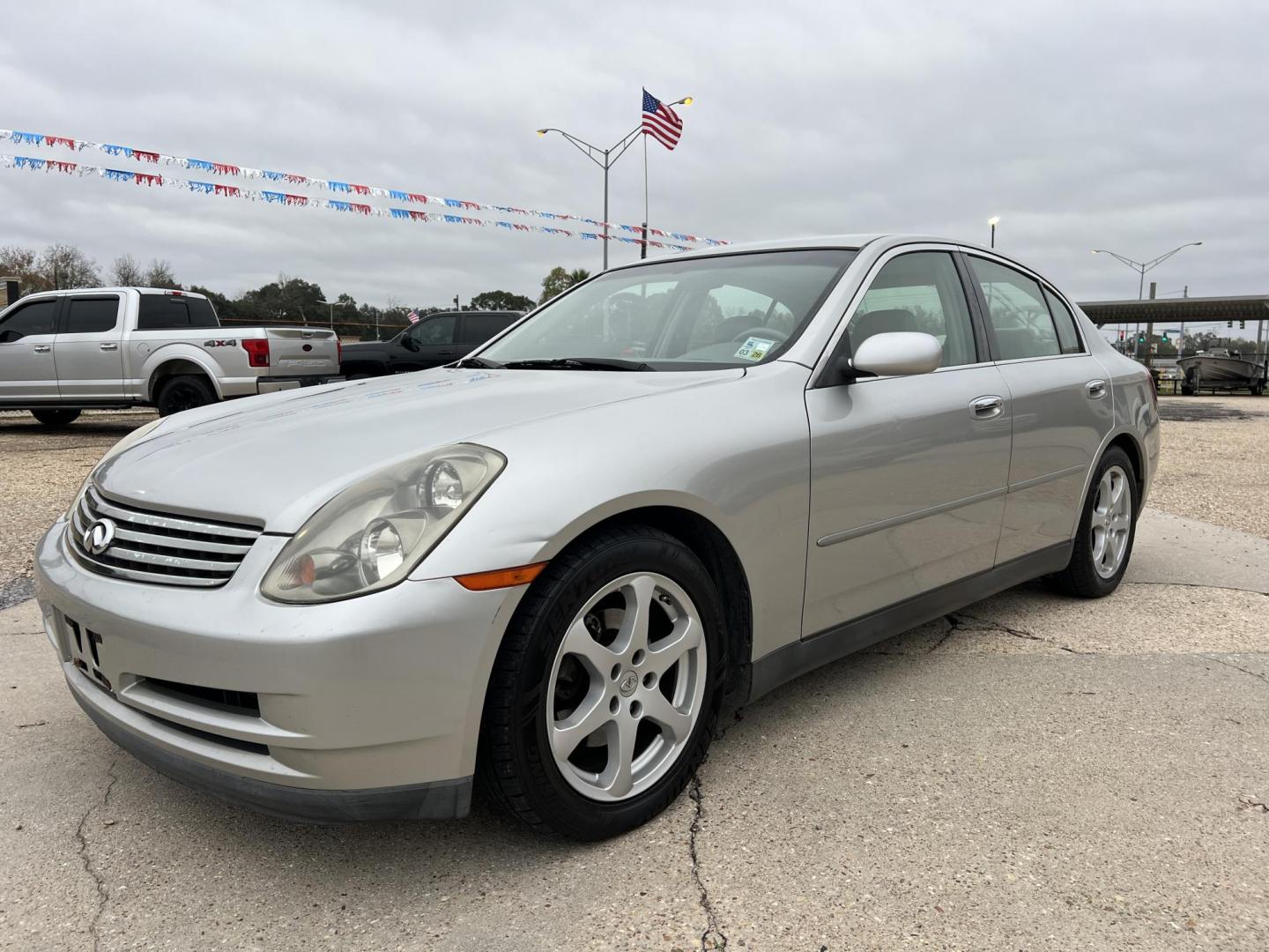 2004 Silver /Gray Infiniti G35 (JNKCV51E14M) with an 3.5L V6 DOHC 24V engine, 5-Speed Automatic Overdrive transmission, located at 4520 Airline Hwy, Baton Rouge, LA, 70805, (225) 357-1497, 30.509325, -91.145432 - 2004 Infiniti G35 ***TWO OWNER & NO ACCIDENTS*** 3.5 V6 Gas, Only 72K Miles, Heated Leather, Sunroof, A/C & Heat, Power Seat, Windows, Locks & Mirrors. FOR INFO PLEASE CONTACT JEFF AT 225-413-0981. CHECK OUT OUR A+ RATING WITH THE BETTER BUSINESS BUREAU. WE HAVE BEEN A FAMILY OWNED AND OPERATED BUS - Photo#0