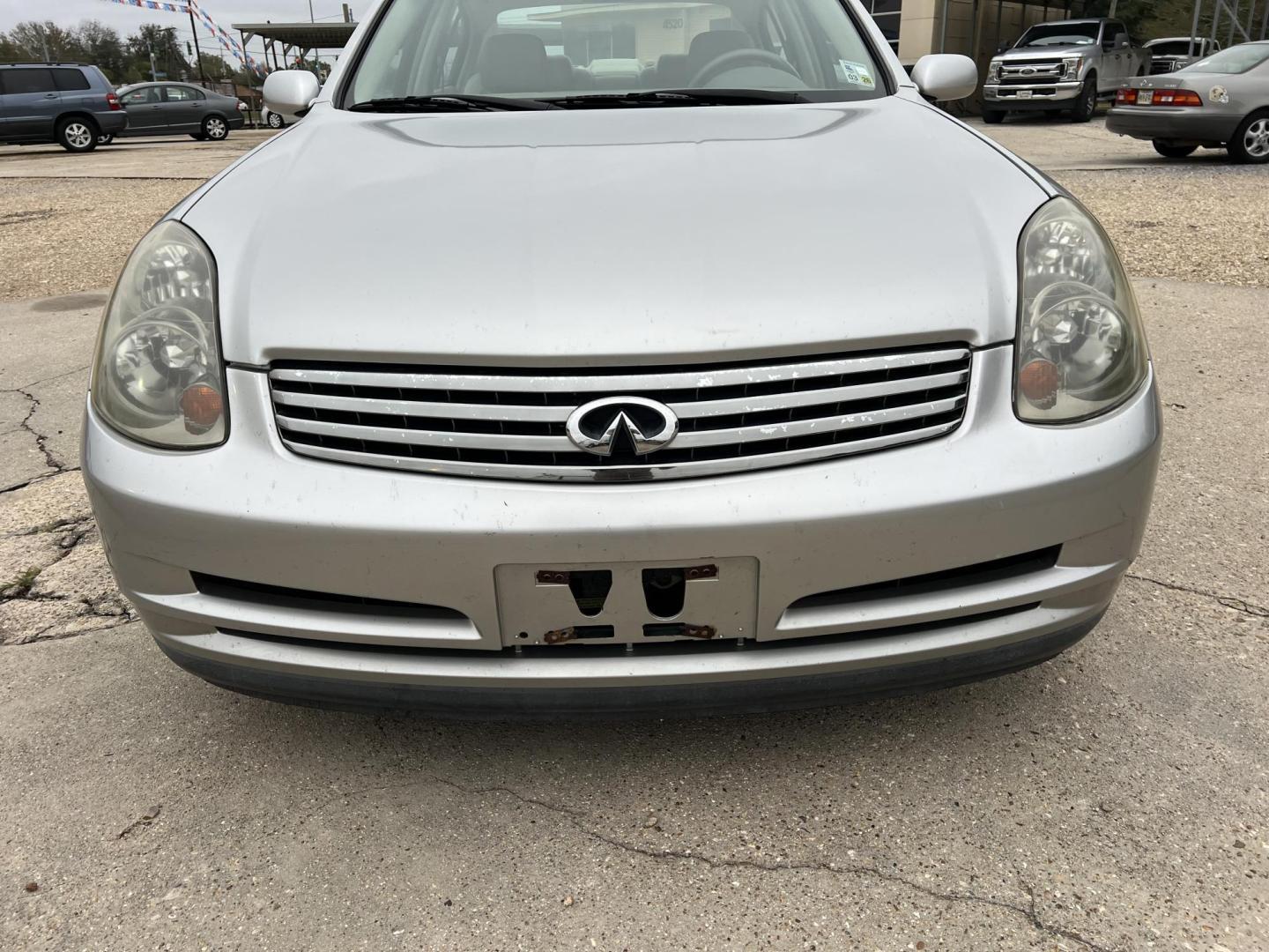 2004 Silver /Gray Infiniti G35 (JNKCV51E14M) with an 3.5L V6 DOHC 24V engine, 5-Speed Automatic Overdrive transmission, located at 4520 Airline Hwy, Baton Rouge, LA, 70805, (225) 357-1497, 30.509325, -91.145432 - 2004 Infiniti G35 ***TWO OWNER & NO ACCIDENTS*** 3.5 V6 Gas, Only 72K Miles, Heated Leather, Sunroof, A/C & Heat, Power Seat, Windows, Locks & Mirrors. FOR INFO PLEASE CONTACT JEFF AT 225-413-0981. CHECK OUT OUR A+ RATING WITH THE BETTER BUSINESS BUREAU. WE HAVE BEEN A FAMILY OWNED AND OPERATED BUS - Photo#2