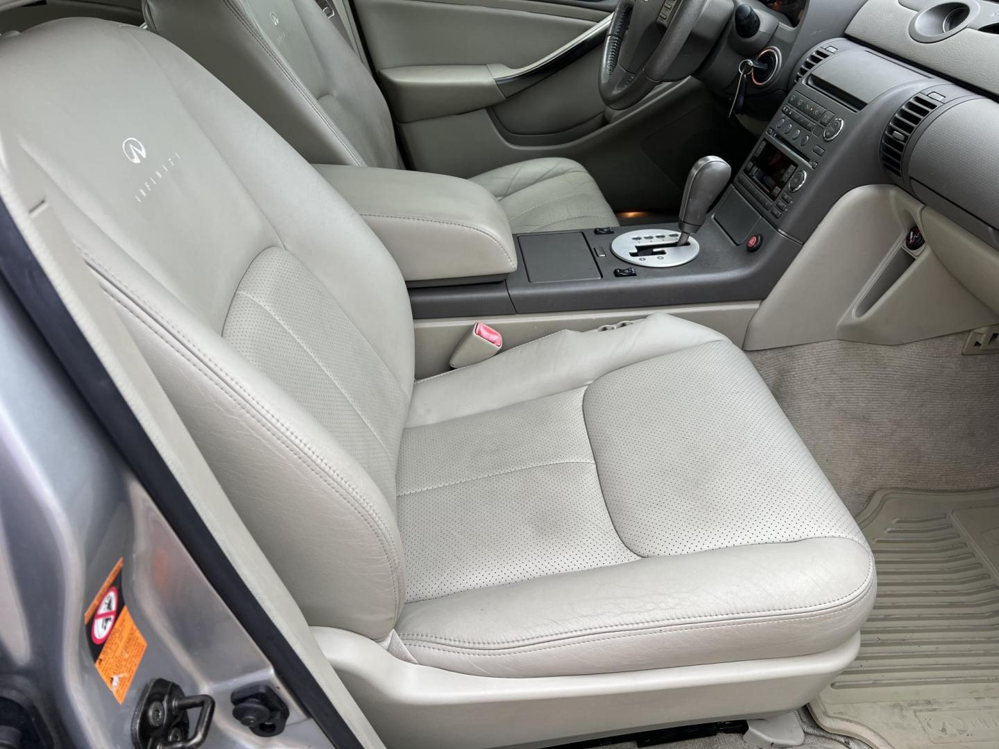 2004 Silver /Gray Infiniti G35 (JNKCV51E14M) with an 3.5L V6 DOHC 24V engine, 5-Speed Automatic Overdrive transmission, located at 4520 Airline Hwy, Baton Rouge, LA, 70805, (225) 357-1497, 30.509325, -91.145432 - 2004 Infiniti G35 ***TWO OWNER & NO ACCIDENTS*** 3.5 V6 Gas, Only 72K Miles, Heated Leather, Sunroof, A/C & Heat, Power Seat, Windows, Locks & Mirrors. FOR INFO PLEASE CONTACT JEFF AT 225-413-0981. CHECK OUT OUR A+ RATING WITH THE BETTER BUSINESS BUREAU. WE HAVE BEEN A FAMILY OWNED AND OPERATED BUS - Photo#9