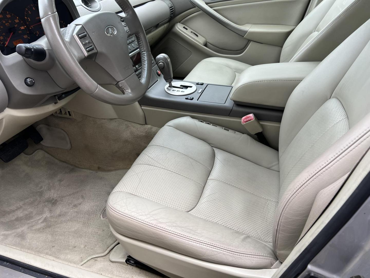 2004 Silver /Gray Infiniti G35 (JNKCV51E14M) with an 3.5L V6 DOHC 24V engine, 5-Speed Automatic Overdrive transmission, located at 4520 Airline Hwy, Baton Rouge, LA, 70805, (225) 357-1497, 30.509325, -91.145432 - 2004 Infiniti G35 ***TWO OWNER & NO ACCIDENTS*** 3.5 V6 Gas, Only 72K Miles, Heated Leather, Sunroof, A/C & Heat, Power Seat, Windows, Locks & Mirrors. FOR INFO PLEASE CONTACT JEFF AT 225-413-0981. CHECK OUT OUR A+ RATING WITH THE BETTER BUSINESS BUREAU. WE HAVE BEEN A FAMILY OWNED AND OPERATED BUS - Photo#8