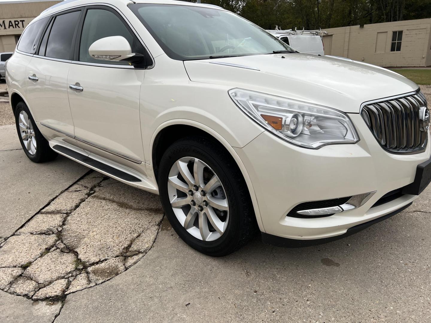 2015 White /Peanut Butter Buick Enclave Premium (5GAKRCKD4FJ) with an 3.6L V6 DOHC 24V engine, 6-Speed Automatic Overdrive transmission, located at 4520 Airline Hwy, Baton Rouge, LA, 70805, (225) 357-1497, 30.509325, -91.145432 - 2015 Buick Enclave Premium **NO ACCIDENTS** 3.6 V6 Gas, 121K Miles, Sunroof, Heated & Cooled Leather Seats, 7 Passenger Seating, All Power, Bose Stereo, Backup Camera, Tow Package & More. FOR INFO PLEASE CONTACT JEFF AT 225-413-0981. CHECK OUT OUR A+ RATING WITH THE BETTER BUSINESS BUREAU. WE HAVE B - Photo#3