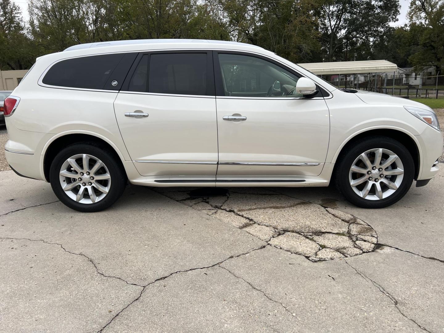 2015 White /Peanut Butter Buick Enclave Premium (5GAKRCKD4FJ) with an 3.6L V6 DOHC 24V engine, 6-Speed Automatic Overdrive transmission, located at 4520 Airline Hwy, Baton Rouge, LA, 70805, (225) 357-1497, 30.509325, -91.145432 - 2015 Buick Enclave Premium **NO ACCIDENTS** 3.6 V6 Gas, 121K Miles, Sunroof, Heated & Cooled Leather Seats, 7 Passenger Seating, All Power, Bose Stereo, Backup Camera, Tow Package & More. FOR INFO PLEASE CONTACT JEFF AT 225-413-0981. CHECK OUT OUR A+ RATING WITH THE BETTER BUSINESS BUREAU. WE HAVE B - Photo#4