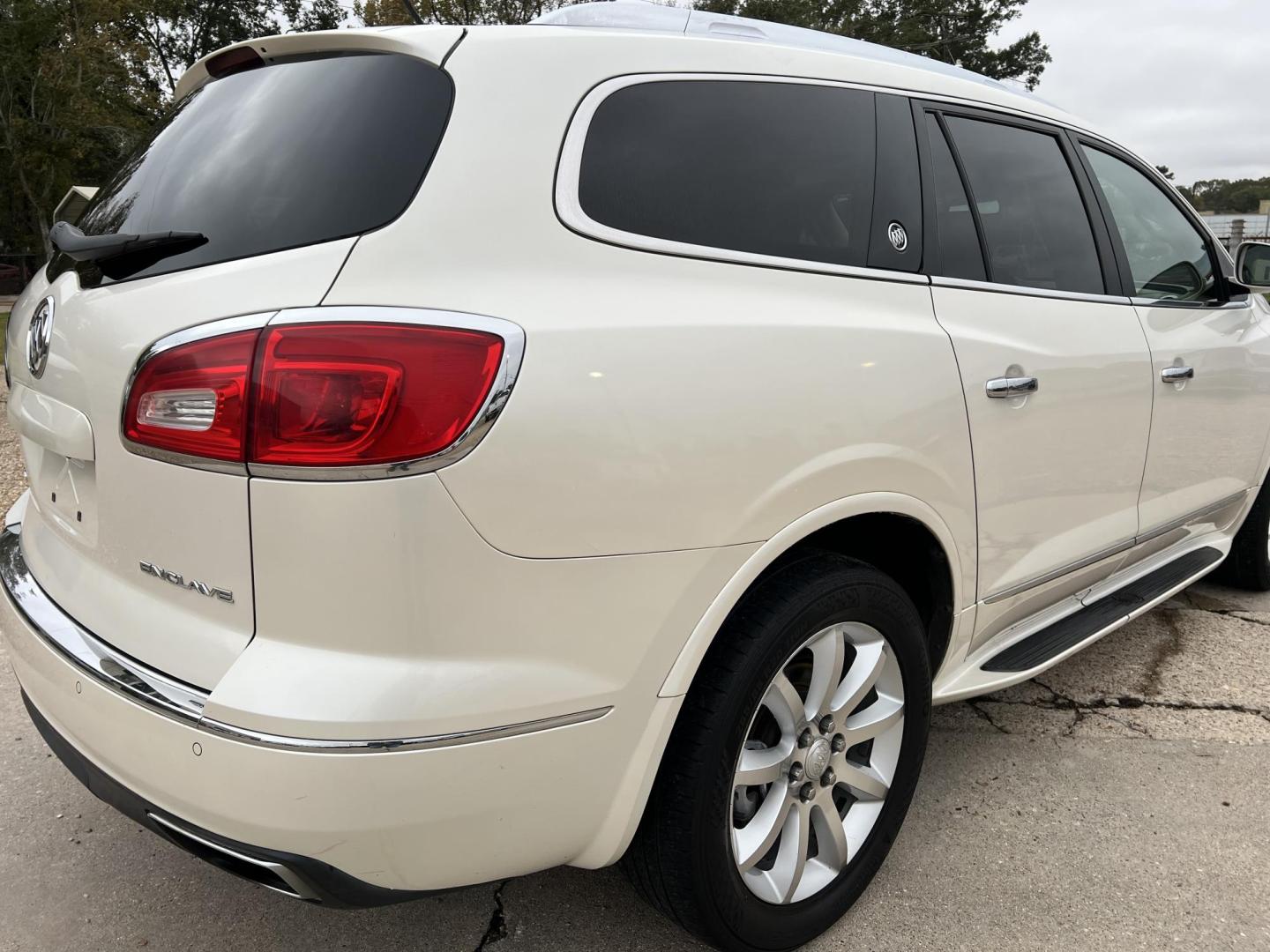 2015 White /Peanut Butter Buick Enclave Premium (5GAKRCKD4FJ) with an 3.6L V6 DOHC 24V engine, 6-Speed Automatic Overdrive transmission, located at 4520 Airline Hwy, Baton Rouge, LA, 70805, (225) 357-1497, 30.509325, -91.145432 - 2015 Buick Enclave Premium **NO ACCIDENTS** 3.6 V6 Gas, 121K Miles, Sunroof, Heated & Cooled Leather Seats, 7 Passenger Seating, All Power, Bose Stereo, Backup Camera, Tow Package & More. FOR INFO PLEASE CONTACT JEFF AT 225-413-0981. CHECK OUT OUR A+ RATING WITH THE BETTER BUSINESS BUREAU. WE HAVE B - Photo#5