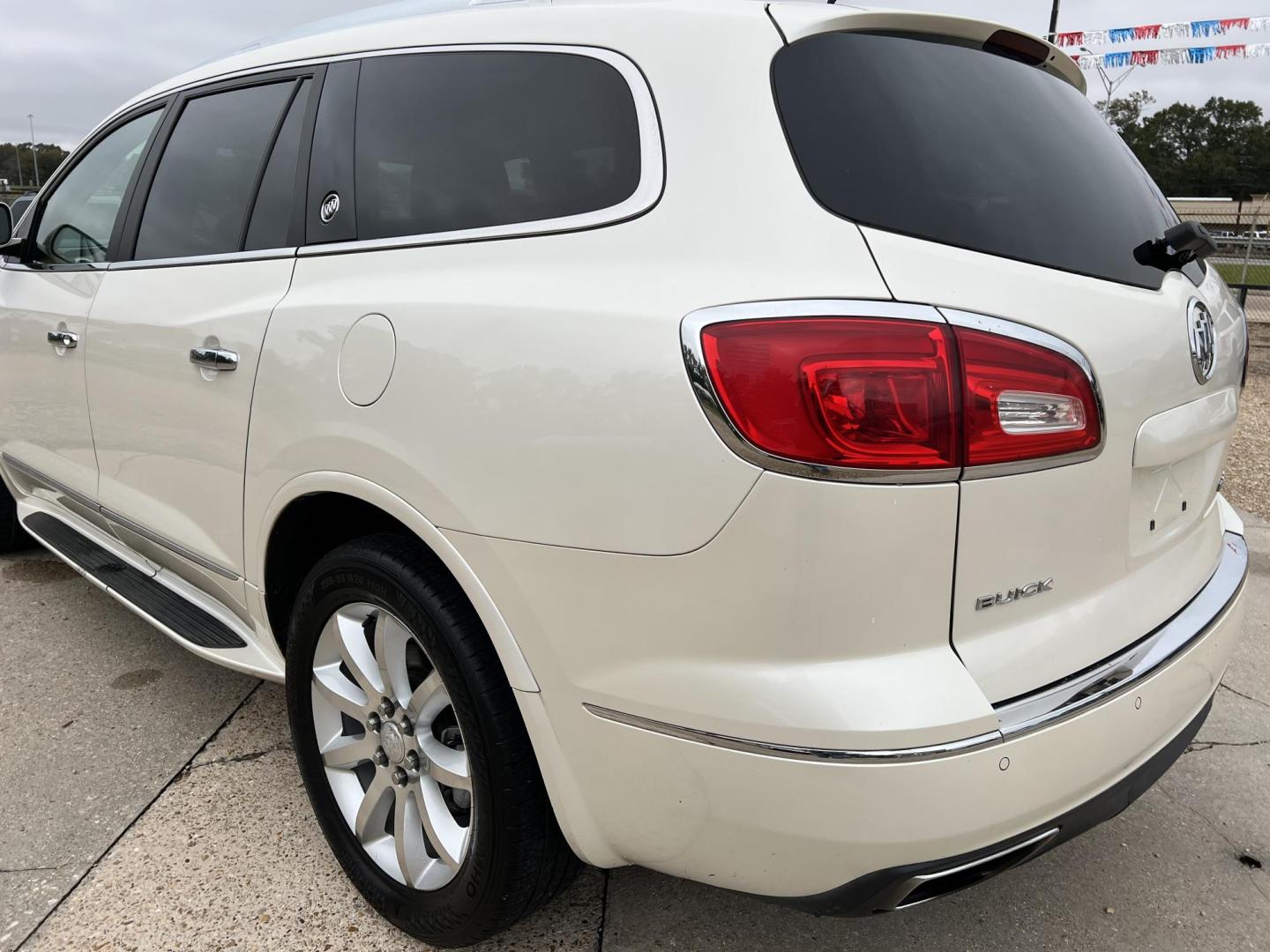 2015 White /Peanut Butter Buick Enclave Premium (5GAKRCKD4FJ) with an 3.6L V6 DOHC 24V engine, 6-Speed Automatic Overdrive transmission, located at 4520 Airline Hwy, Baton Rouge, LA, 70805, (225) 357-1497, 30.509325, -91.145432 - 2015 Buick Enclave Premium **NO ACCIDENTS** 3.6 V6 Gas, 121K Miles, Sunroof, Heated & Cooled Leather Seats, 7 Passenger Seating, All Power, Bose Stereo, Backup Camera, Tow Package & More. FOR INFO PLEASE CONTACT JEFF AT 225-413-0981. CHECK OUT OUR A+ RATING WITH THE BETTER BUSINESS BUREAU. WE HAVE B - Photo#7