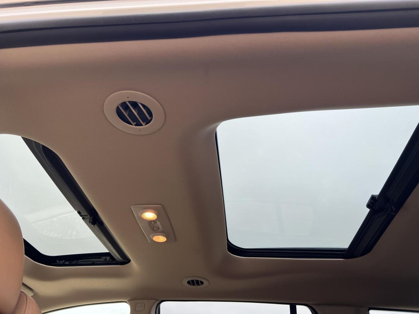 2015 White /Peanut Butter Buick Enclave Premium (5GAKRCKD4FJ) with an 3.6L V6 DOHC 24V engine, 6-Speed Automatic Overdrive transmission, located at 4520 Airline Hwy, Baton Rouge, LA, 70805, (225) 357-1497, 30.509325, -91.145432 - 2015 Buick Enclave Premium **NO ACCIDENTS** 3.6 V6 Gas, 121K Miles, Sunroof, Heated & Cooled Leather Seats, 7 Passenger Seating, All Power, Bose Stereo, Backup Camera, Tow Package & More. FOR INFO PLEASE CONTACT JEFF AT 225-413-0981. CHECK OUT OUR A+ RATING WITH THE BETTER BUSINESS BUREAU. WE HAVE B - Photo#16