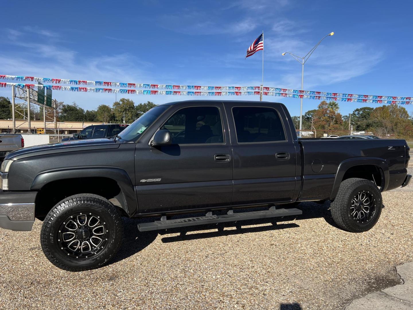 2004 Dark Spiral Gray /Gray Chevrolet Silverado 2500 LS (1GCGC23UX4F) with an 6.0L V8 OHV 16V engine, 4-Speed Automatic Overdrive transmission, located at 4520 Airline Hwy, Baton Rouge, LA, 70805, (225) 357-1497, 30.509325, -91.145432 - 2004 Chevrolet Silverado 2500 Crew Cab LS 2WD ***TWO OWNER & NO ACCIDENTS*** 6.0 V8 Gas, 147K Miles, A/C & Heat, Power Windows, Locks & Mirrors, Backup Camera, Spray In Bedliner, HELO Wheels, Bilstein Shocks, New Brakes, Tow Package. FOR INFO PLEASE CONTACT JEFF AT 225-413-0981. CHECK OUT OUR A+ RAT - Photo#1