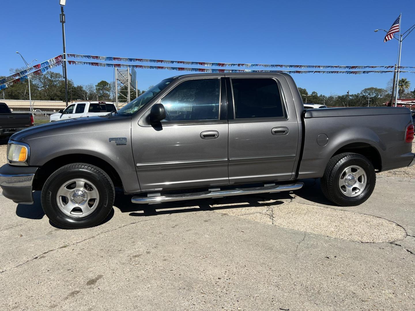 2003 Gray /Gray Ford F-150 XLT (1FTRW07643K) with an 4.6L V8 SOHC 16V engine, 4-Speed Automatic Overdrive transmission, located at 4520 Airline Hwy, Baton Rouge, LA, 70805, (225) 357-1497, 30.509325, -91.145432 - 2003 Ford F-150 SuperCrew XLT **ONE OWNER** 4.6 V8 Gas, 158K Miles, Automatic, A/C & Heat, Power Windows & Locks, Bedcover, Alloy Wheels. FOR INFO PLEASE CONTACT JEFF AT 225-413-0981. CHECK OUT OUR A+ RATING WITH THE BETTER BUSINESS BUREAU. WE HAVE BEEN A FAMILY OWNED AND OPERATED BUSINESS AT THE S - Photo#1