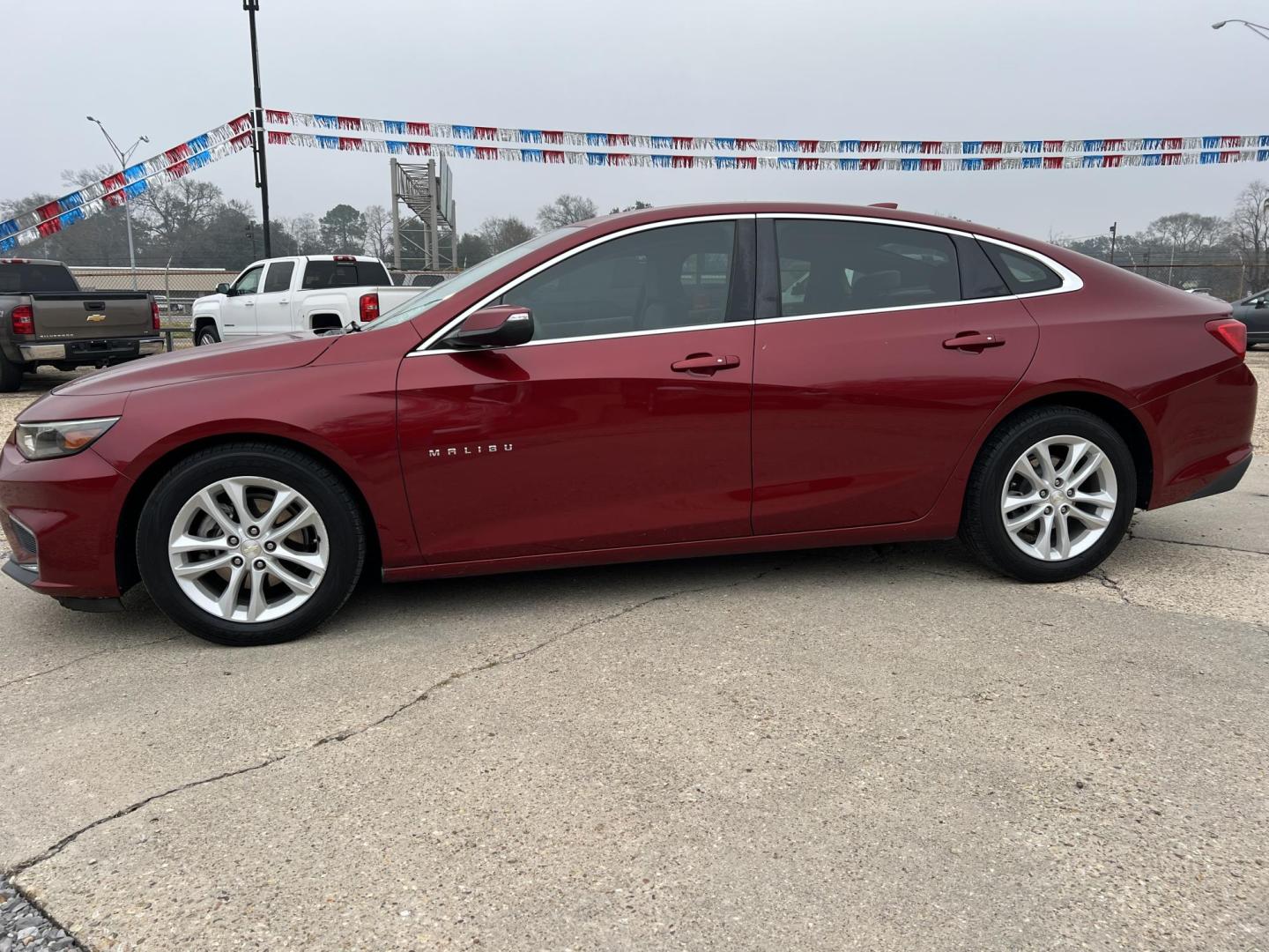 2017 Maroon /Gray Chevrolet Malibu LT (1G1ZE5ST4HF) with an 1.5L L4 DOHC 16V engine, Automatic transmission, located at 4520 Airline Hwy, Baton Rouge, LA, 70805, (225) 357-1497, 30.509325, -91.145432 - 2017 Chevrolet Malibu LT **NO ACCIDENTS** 1.5 4 Cylinder Gas Saver, 94K Miles, A/C & Heat, Touch Screen Radio With Backup Camera, Power Windows, Locks & Mirrors. Paint Is Faded. FOR INFO PLEASE CONTACT JEFF AT 225-413-0981. CHECK OUT OUR A+ RATING WITH THE BETTER BUSINESS BUREAU. WE HAVE BEEN A FAMI - Photo#1