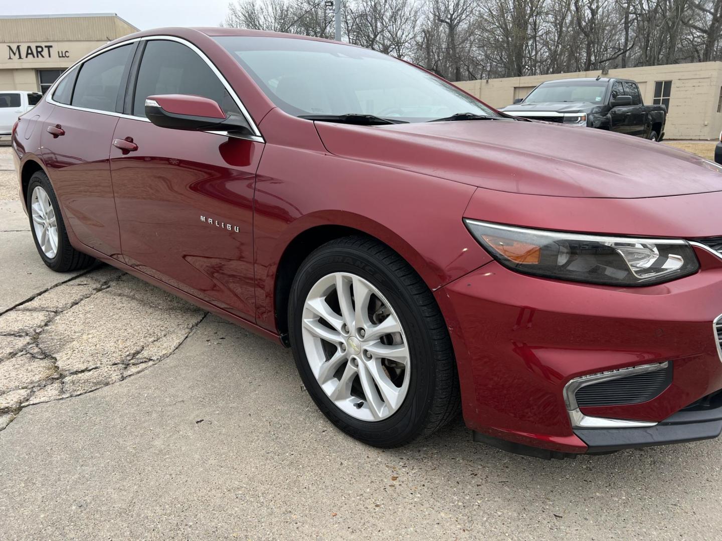 2017 Maroon /Gray Chevrolet Malibu LT (1G1ZE5ST4HF) with an 1.5L L4 DOHC 16V engine, Automatic transmission, located at 4520 Airline Hwy, Baton Rouge, LA, 70805, (225) 357-1497, 30.509325, -91.145432 - 2017 Chevrolet Malibu LT **NO ACCIDENTS** 1.5 4 Cylinder Gas Saver, 94K Miles, A/C & Heat, Touch Screen Radio With Backup Camera, Power Windows, Locks & Mirrors. Paint Is Faded. FOR INFO PLEASE CONTACT JEFF AT 225-413-0981. CHECK OUT OUR A+ RATING WITH THE BETTER BUSINESS BUREAU. WE HAVE BEEN A FAMI - Photo#3
