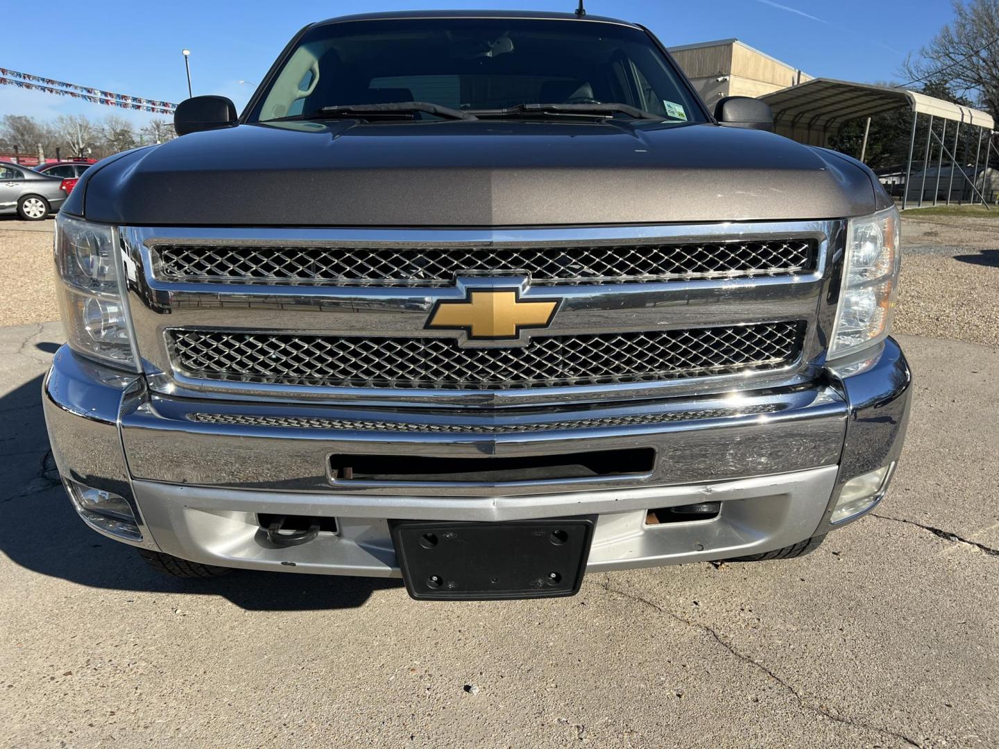 2012 Brown /Black Chevrolet Silverado 1500 LT Z71 (1GCRKSE76CZ) with an 5.3L V8 engine, 6-Speed Automatic transmission, located at 4520 Airline Hwy, Baton Rouge, LA, 70805, (225) 357-1497, 30.509325, -91.145432 - 2012 Chevrolet Silverado 1500 Ext Cab LT Z71 4X4 5.3 V8 Gas, 176K Miles, Leather Seats, Cold A/C, Power Windows, Locks & Mirrors, Bed Cover, Tow Package. FOR INFO PLEASE CONTACT JEFF AT 225-413-0981. CHECK OUT OUR A+ RATING WITH THE BETTER BUSINESS BUREAU. WE HAVE BEEN A FAMILY OWNED AND OPERATED - Photo#2