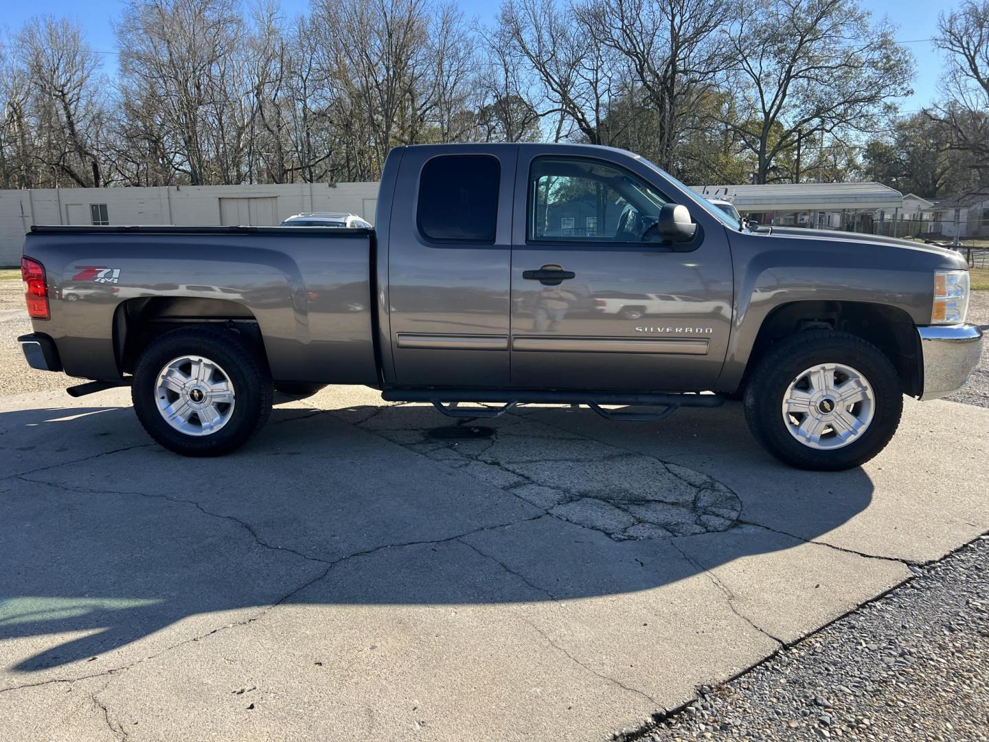 2012 Brown /Black Chevrolet Silverado 1500 LT Z71 (1GCRKSE76CZ) with an 5.3L V8 engine, 6-Speed Automatic transmission, located at 4520 Airline Hwy, Baton Rouge, LA, 70805, (225) 357-1497, 30.509325, -91.145432 - 2012 Chevrolet Silverado 1500 Ext Cab LT Z71 4X4 5.3 V8 Gas, 176K Miles, Leather Seats, Cold A/C, Power Windows, Locks & Mirrors, Bed Cover, Tow Package. FOR INFO PLEASE CONTACT JEFF AT 225-413-0981. CHECK OUT OUR A+ RATING WITH THE BETTER BUSINESS BUREAU. WE HAVE BEEN A FAMILY OWNED AND OPERATED - Photo#4