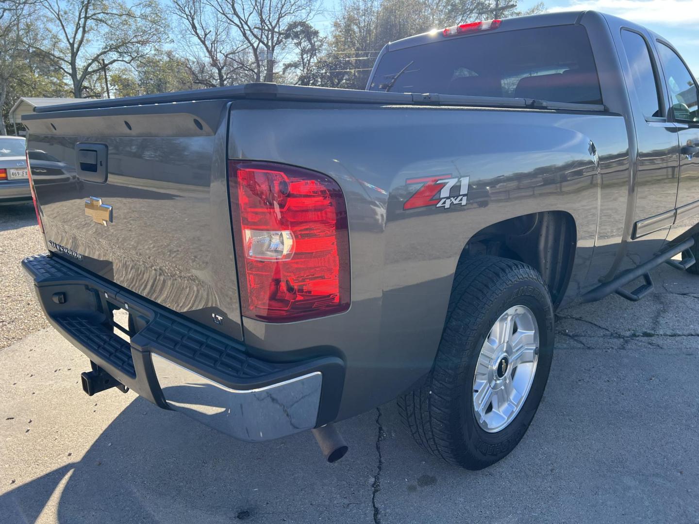 2012 Brown /Black Chevrolet Silverado 1500 LT Z71 (1GCRKSE76CZ) with an 5.3L V8 engine, 6-Speed Automatic transmission, located at 4520 Airline Hwy, Baton Rouge, LA, 70805, (225) 357-1497, 30.509325, -91.145432 - 2012 Chevrolet Silverado 1500 Ext Cab LT Z71 4X4 5.3 V8 Gas, 176K Miles, Leather Seats, Cold A/C, Power Windows, Locks & Mirrors, Bed Cover, Tow Package. FOR INFO PLEASE CONTACT JEFF AT 225-413-0981. CHECK OUT OUR A+ RATING WITH THE BETTER BUSINESS BUREAU. WE HAVE BEEN A FAMILY OWNED AND OPERATED - Photo#5