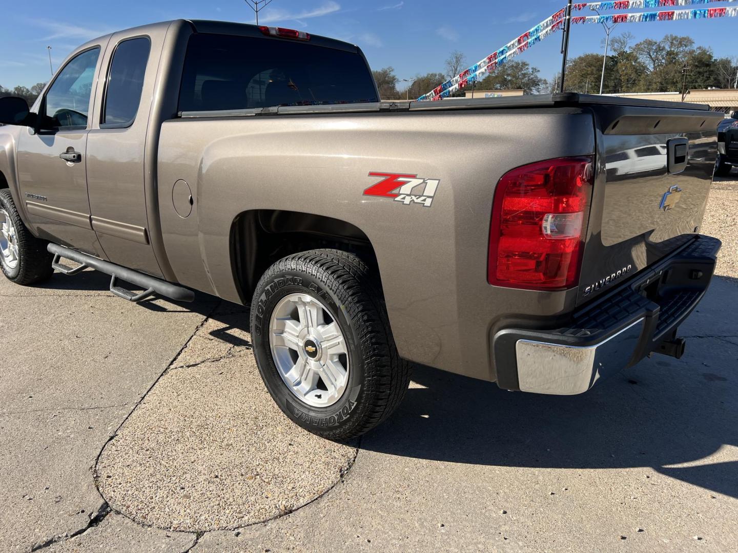 2012 Brown /Black Chevrolet Silverado 1500 LT Z71 (1GCRKSE76CZ) with an 5.3L V8 engine, 6-Speed Automatic transmission, located at 4520 Airline Hwy, Baton Rouge, LA, 70805, (225) 357-1497, 30.509325, -91.145432 - 2012 Chevrolet Silverado 1500 Ext Cab LT Z71 4X4 5.3 V8 Gas, 176K Miles, Leather Seats, Cold A/C, Power Windows, Locks & Mirrors, Bed Cover, Tow Package. FOR INFO PLEASE CONTACT JEFF AT 225-413-0981. CHECK OUT OUR A+ RATING WITH THE BETTER BUSINESS BUREAU. WE HAVE BEEN A FAMILY OWNED AND OPERATED - Photo#7