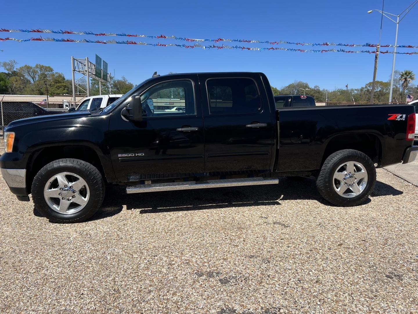 2014 Black /Black GMC Sierra 2500HD SLE Z71 (1GT120C88EF) with an 6.6L V8 OHV 32V TURBO DIESEL engine, 6-Speed Automatic transmission, located at 4520 Airline Hwy, Baton Rouge, LA, 70805, (225) 357-1497, 30.509325, -91.145432 - 2014 GMC Sierra 2500HD Crew Cab SLE Z71 4X4 **ONE OWNER & NO ACCIDENTS** 6.6 Duramax Diesel, Allison Transmission, Deleted, 234K Miles, Cold A/C, Power Windows, Locks & Mirrors, Spray In Bedliner, 5th Wheel Rails, Tow Package. FOR INFO PLEASE CONTACT JEFF AT 225-413-0981. CHECK OUT OUR A+ RATING WI - Photo#1