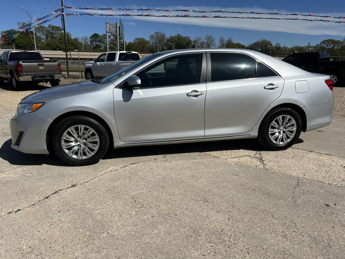 2012 Silver /Gray Toyota Camry LE (4T1BF1FK6CU) with an 2.5L L4 DOHC 16V engine, 6-Speed Automatic transmission, located at 4520 Airline Hwy, Baton Rouge, LA, 70805, (225) 357-1497, 30.509325, -91.145432 - 2012 Toyota Camry LE 2.5L Gas Saver, 229K Miles, Cold A/C, Power Windows, Locks & Mirrors, Touch Screen Radio. FOR INFO PLEASE CONTACT JEFF AT 225-413-0981. CHECK OUT OUR A+ RATING WITH THE BETTER BUSINESS BUREAU. WE HAVE BEEN A FAMILY OWNED AND OPERATED BUSINESS AT THE SAME LOCATION FOR OVER 48 YE - Photo#1