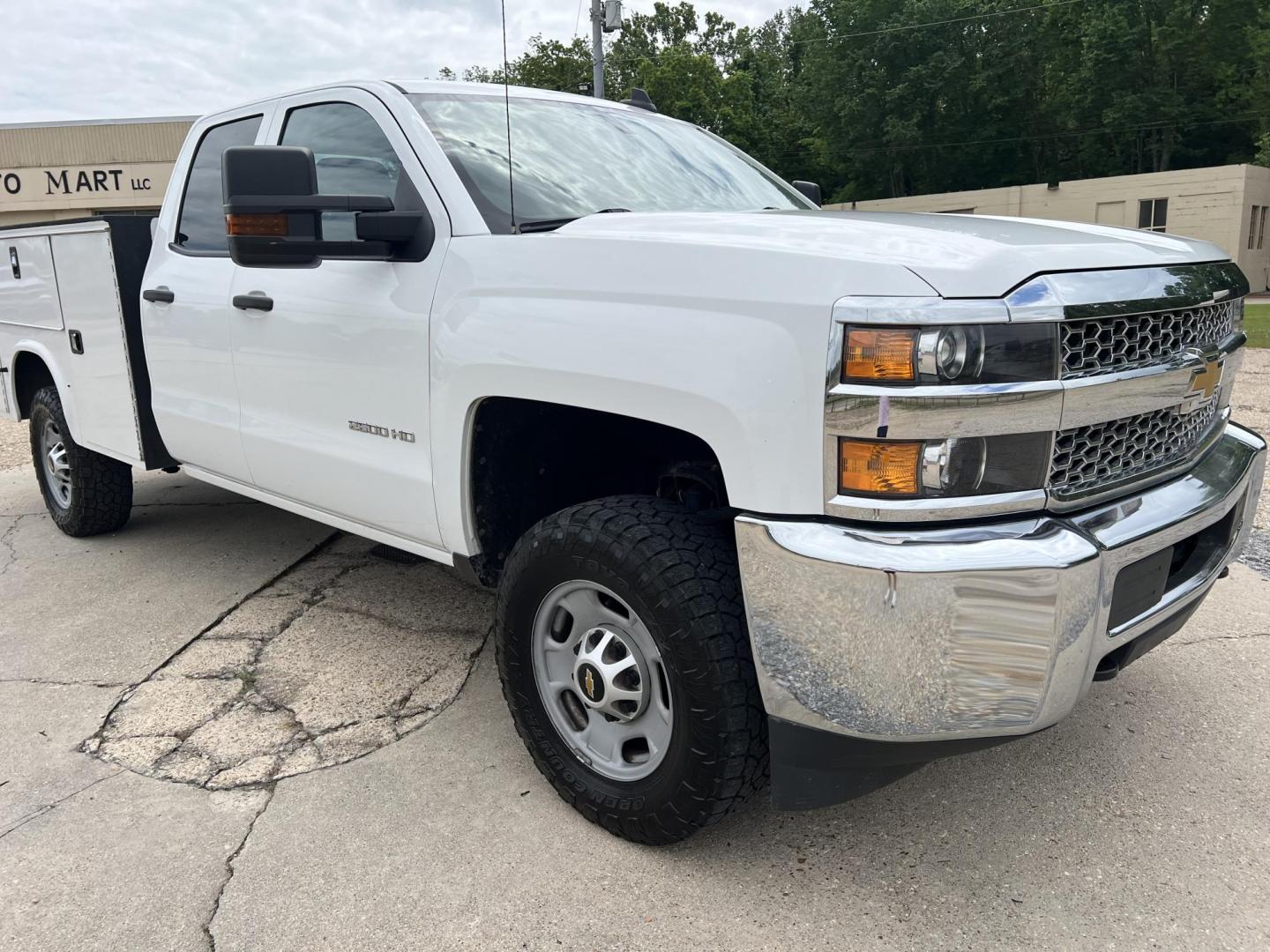 2019 White /Gray Chevrolet Silverado 2500HD Work Truck (2GB2CREG8K1) with an 6.0L V8 engine, 6-Speed Automatic transmission, located at 4520 Airline Hwy, Baton Rouge, LA, 70805, (225) 357-1497, 30.509325, -91.145432 - 2019 Chevrolet Silverado 2500HD Double Cab 2WD **ONE OWNER** Knapheide Utility Bed, 6.0 V8 Gas, 237K Miles, Cold A/C, Power Windows, Locks & Mirrors, Tow Package. FOR INFO PLEASE CONTACT JEFF AT 225-413-0981. CHECK OUT OUR A+ RATING WITH THE BETTER BUSINESS BUREAU. WE HAVE BEEN A FAMILY OWNED AND O - Photo#3