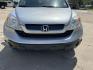 2009 Silver /Gray Honda CR-V LX (3CZRE38389G) with an 2.4L L4 DOHC 16V engine, Automatic transmission, located at 4520 Airline Hwy, Baton Rouge, LA, 70805, (225) 357-1497, 30.509325, -91.145432 - 2009 Honda CR-V LX 2.4L 4 Cylinder Gas Saver, 135K Miles, Cold A/C, Power Windows, Locks & Mirrors, Seating For 5. FOR INFO PLEASE CONTACT JEFF AT 225-413-0981. CHECK OUT OUR A+ RATING WITH THE BETTER BUSINESS BUREAU. WE HAVE BEEN A FAMILY OWNED AND OPERATED BUSINESS AT THE SAME LOCATION FOR OVER 4 - Photo#2