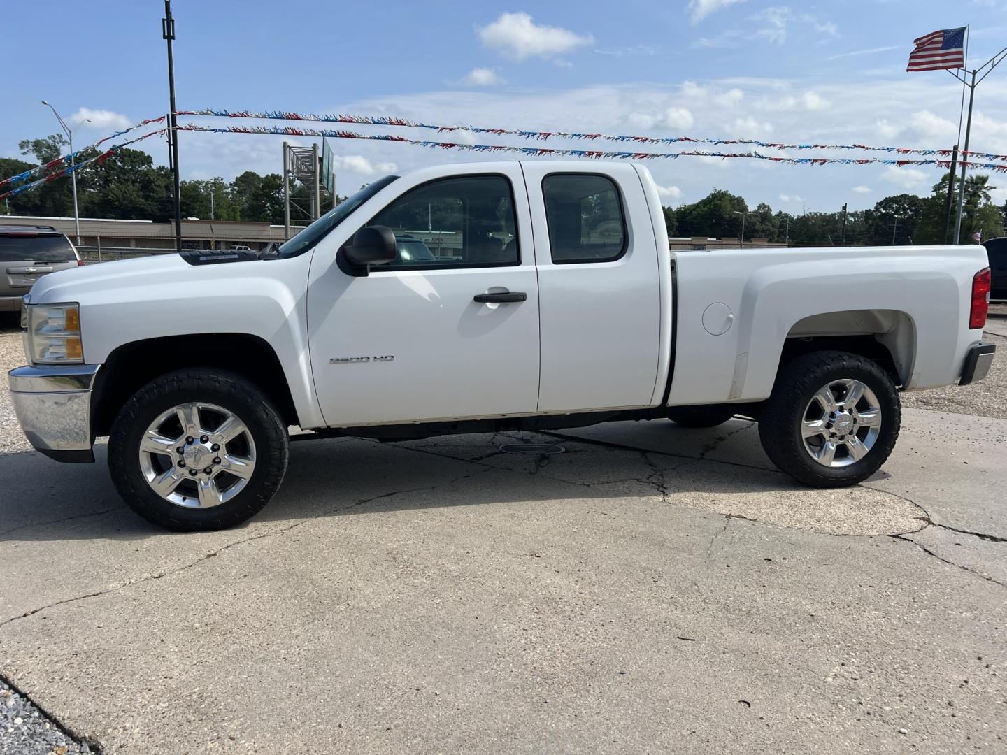 2012 White /Gray Chevrolet Silverado 2500HD Work Truck (1GC2CVCG7CZ) with an 6.0L V8 OHV 16V FFV engine, 6-Speed Automatic transmission, located at 4520 Airline Hwy, Baton Rouge, LA, 70805, (225) 357-1497, 30.509325, -91.145432 - 2012 Chevrolet Silverado 2500HD Ext Cab 2WD **ONLY 82K Miles, 6.0 V8 Gas, Cold A/C, Power Windows, Locks & Mirrors, Alloy 20'' Wheels, Tow Package. Rear Seat Has Been Taken Out For Professional Built Shelves. FOR INFO PLEASE CONTACT JEFF AT 225-413-0981. CHECK OUT OUR A+ RATING WITH THE BETTER BUSIN - Photo#1