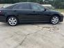 2007 Black /Gray Toyota Camry SE (4T1BK46K47U) with an 3.5L V6 DOHC 24V engine, 6-Speed Automatic Overdrive transmission, located at 4520 Airline Hwy, Baton Rouge, LA, 70805, (225) 357-1497, 30.509325, -91.145432 - 2007 Toyota Camry SE **ONE OWNER & NO ACCIDENTS** 3.5 V6 Gas, 195K Miles, Leather Seats, Cold A/C, Power Windows, Locks & Mirrors, Alloy Wheels. FOR INFO PLEASE CONTACT JEFF AT 225-413-0981. CHECK OUT OUR A+ RATING WITH THE BETTER BUSINESS BUREAU. WE HAVE BEEN A FAMILY OWNED AND OPERATED BUSINESS AT - Photo#4