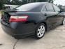 2007 Black /Gray Toyota Camry SE (4T1BK46K47U) with an 3.5L V6 DOHC 24V engine, 6-Speed Automatic Overdrive transmission, located at 4520 Airline Hwy, Baton Rouge, LA, 70805, (225) 357-1497, 30.509325, -91.145432 - 2007 Toyota Camry SE **ONE OWNER & NO ACCIDENTS** 3.5 V6 Gas, 195K Miles, Leather Seats, Cold A/C, Power Windows, Locks & Mirrors, Alloy Wheels. FOR INFO PLEASE CONTACT JEFF AT 225-413-0981. CHECK OUT OUR A+ RATING WITH THE BETTER BUSINESS BUREAU. WE HAVE BEEN A FAMILY OWNED AND OPERATED BUSINESS AT - Photo#5