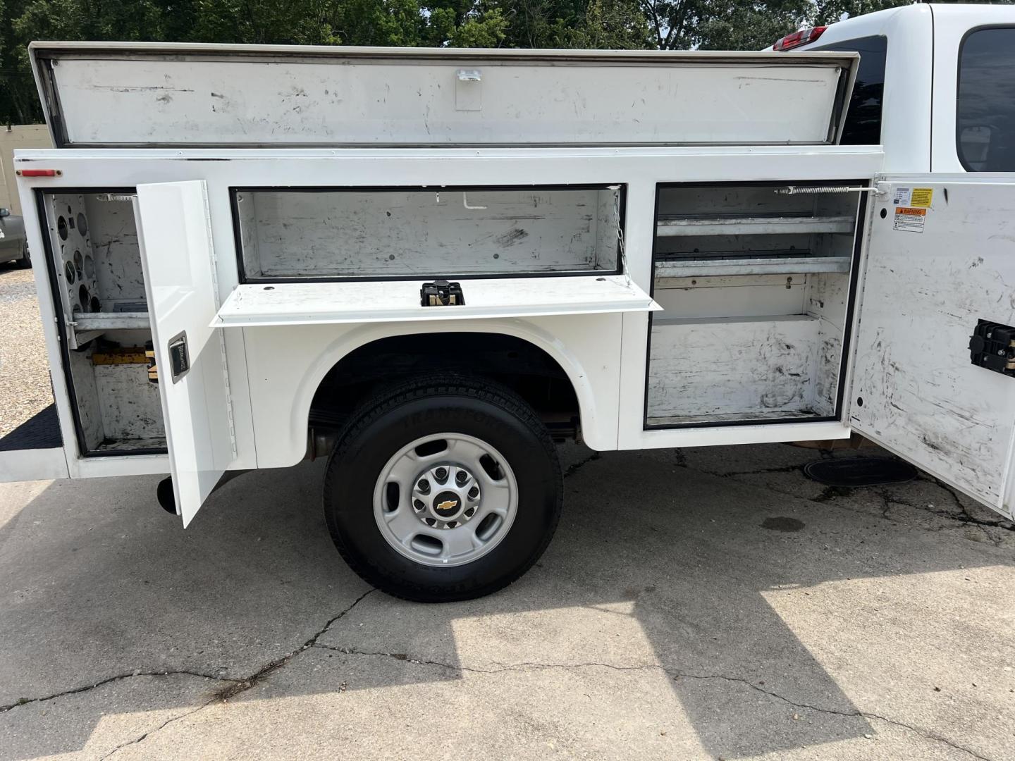 2014 White /Gray Chevrolet Silverado 2500HD Work Truck (1GB1CVC87EF) with an 6.6L V8 OHV 32V TURBO DIESEL engine, Allison transmission, located at 4520 Airline Hwy, Baton Rouge, LA, 70805, (225) 357-1497, 30.509325, -91.145432 - 2014 Chevrolet Silverado 2500HD Crew Cab 2WD Knapheide Utility Bed, 6.6 Duramax Diesel, Allison Transmission, 297K Miles, Cold A/C, Power Windows, Locks & Mirrors, New Tires, Tow Package. FOR INFO PLEASE CONTACT JEFF AT 225-413-0981. CHECK OUT OUR A+ RATING WITH THE BETTER BUSINESS BUREAU. WE HAVE B - Photo#10
