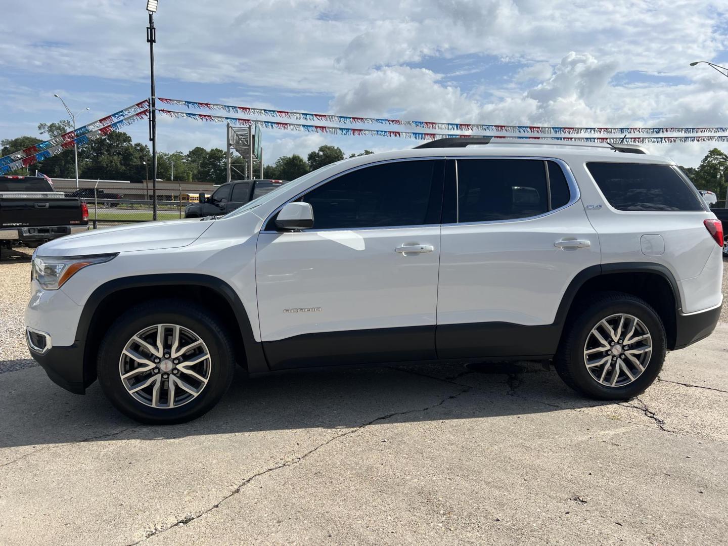 2019 White /Gray GMC Acadia SLE (1GKKNSLS6KZ) with an 3.6L V6 DOHC 24V engine, 6-Speed Automatic transmission, located at 4520 Airline Hwy, Baton Rouge, LA, 70805, (225) 357-1497, 30.509325, -91.145432 - 2019 GMC Acadia SLE AWD **NO ACCIDENTS** 3.6 V6 Gas, 127K Miles, Cold A/C, Power Windows, Locks & Mirrors, 6 Captain Seats, Tow Package. FOR INFO PLEASE CONTACT JEFF AT 225-413-0981. CHECK OUT OUR A+ RATING WITH THE BETTER BUSINESS BUREAU. WE HAVE BEEN A FAMILY OWNED AND OPERATED BUSINESS AT THE SAM - Photo#1