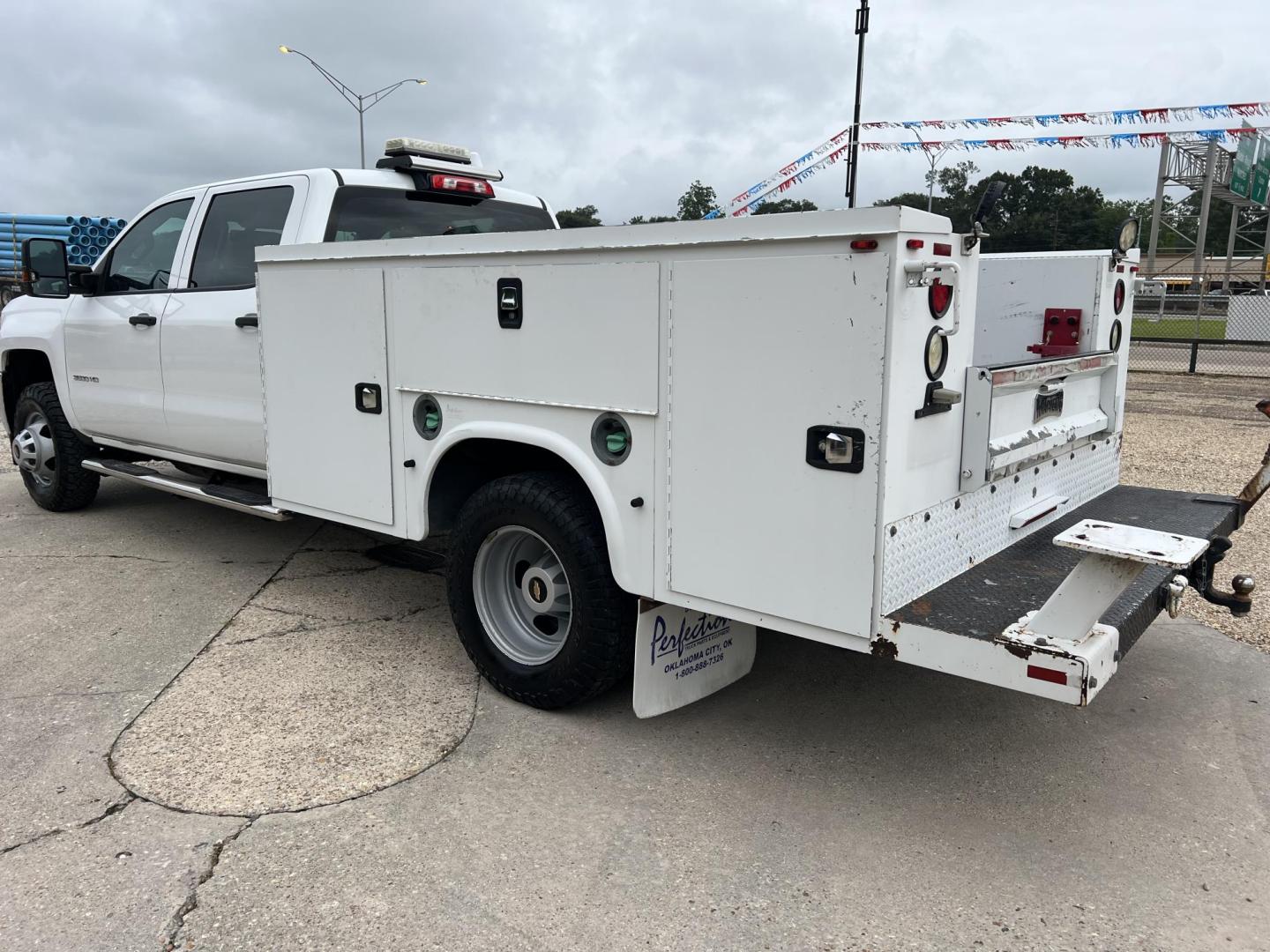 2015 White /Gray Chevrolet Silverado 3500HD Work Truck (1GB4KYC80FF) with an 6.6L V8 OHV 32V TURBO DIESEL engine, Allison transmission, located at 4520 Airline Hwy, Baton Rouge, LA, 70805, (225) 357-1497, 30.509325, -91.145432 - 2015 Chevrolet Silverado 3500HD Crew Cab 4X4 **ONE OWNER & NO ACCIDENTS** 6.6 Duramax Diesel, Allison Transmission, 196K Miles, Cold A/C, Power Windows, Locks & Mirrors, Knapheide Utility Bed, Back Seat Is Missing. FOR INFO PLEASE CONTACT JEFF AT 225-413-0981. CHECK OUT OUR A+ RATING WITH THE BETTER - Photo#7