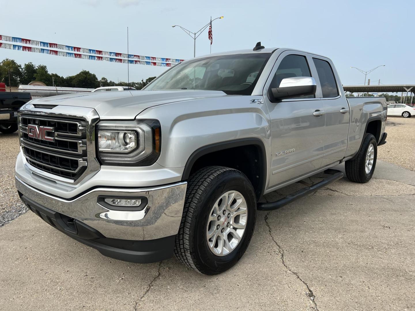 2017 Silver /Gray GMC Sierra 1500 SLE (1GTV2MEC5HZ) with an 5.3L V8 OHV 16V engine, 6-Speed Automatic transmission, located at 4520 Airline Hwy, Baton Rouge, LA, 70805, (225) 357-1497, 30.509325, -91.145432 - 2017 GMC Sierra 1500 Double Cab SLE Z71 4WD 5.3 V8 Gas, 147K Miles, Cold A/C, Power Seat, Windows, Locks & Mirrors, Backup Camera, New Tires, Tow Package. FOR INFO PLEASE CONTACT JEFF AT 225-413-0981. CHECK OUT OUR A+ RATING WITH THE BETTER BUSINESS BUREAU. WE HAVE BEEN A FAMILY OWNED AND OPERATED - Photo#0