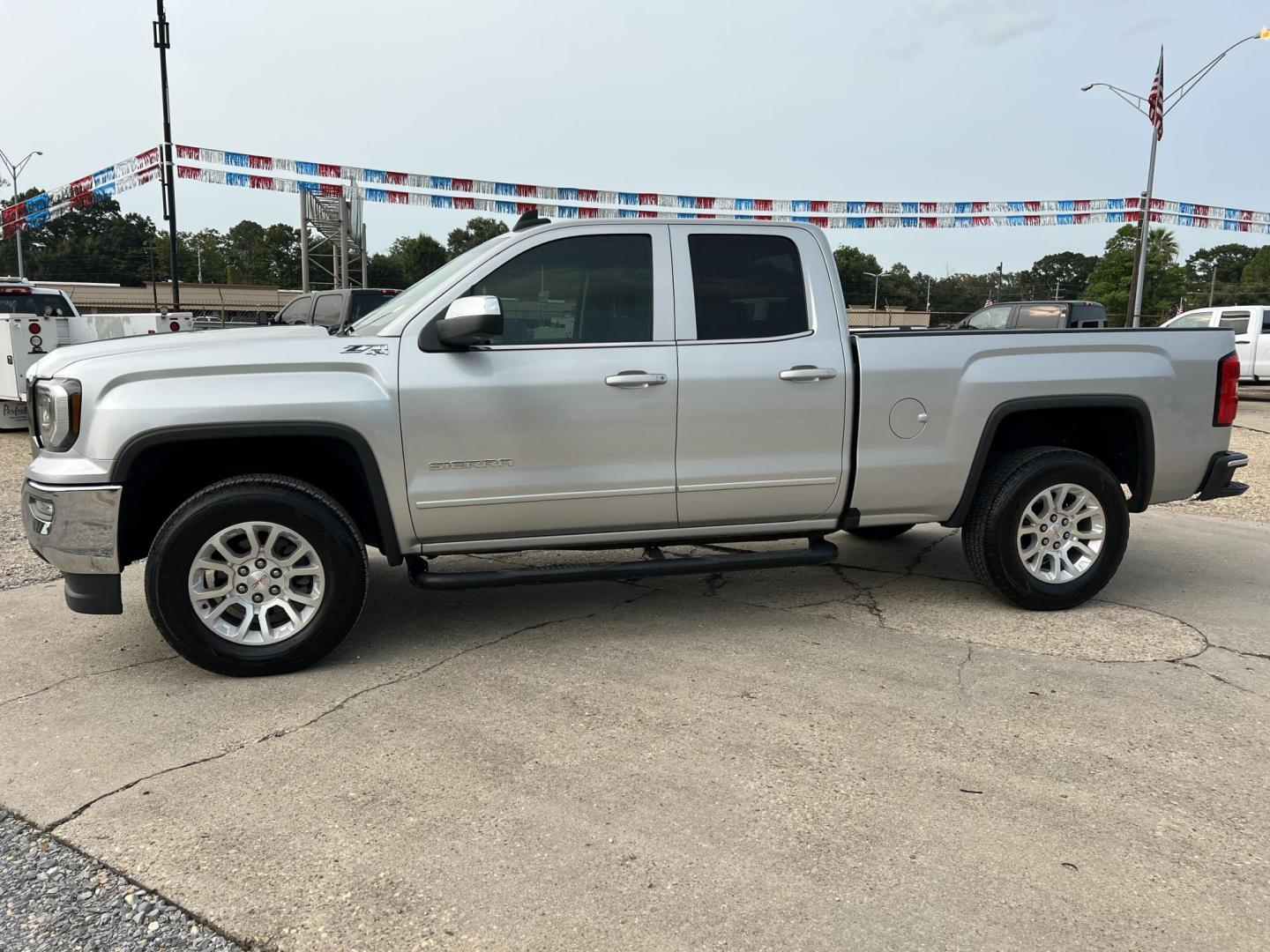 2017 Silver /Gray GMC Sierra 1500 SLE (1GTV2MEC5HZ) with an 5.3L V8 OHV 16V engine, 6-Speed Automatic transmission, located at 4520 Airline Hwy, Baton Rouge, LA, 70805, (225) 357-1497, 30.509325, -91.145432 - 2017 GMC Sierra 1500 Double Cab SLE Z71 4WD 5.3 V8 Gas, 147K Miles, Cold A/C, Power Seat, Windows, Locks & Mirrors, Backup Camera, New Tires, Tow Package. FOR INFO PLEASE CONTACT JEFF AT 225-413-0981. CHECK OUT OUR A+ RATING WITH THE BETTER BUSINESS BUREAU. WE HAVE BEEN A FAMILY OWNED AND OPERATED - Photo#1