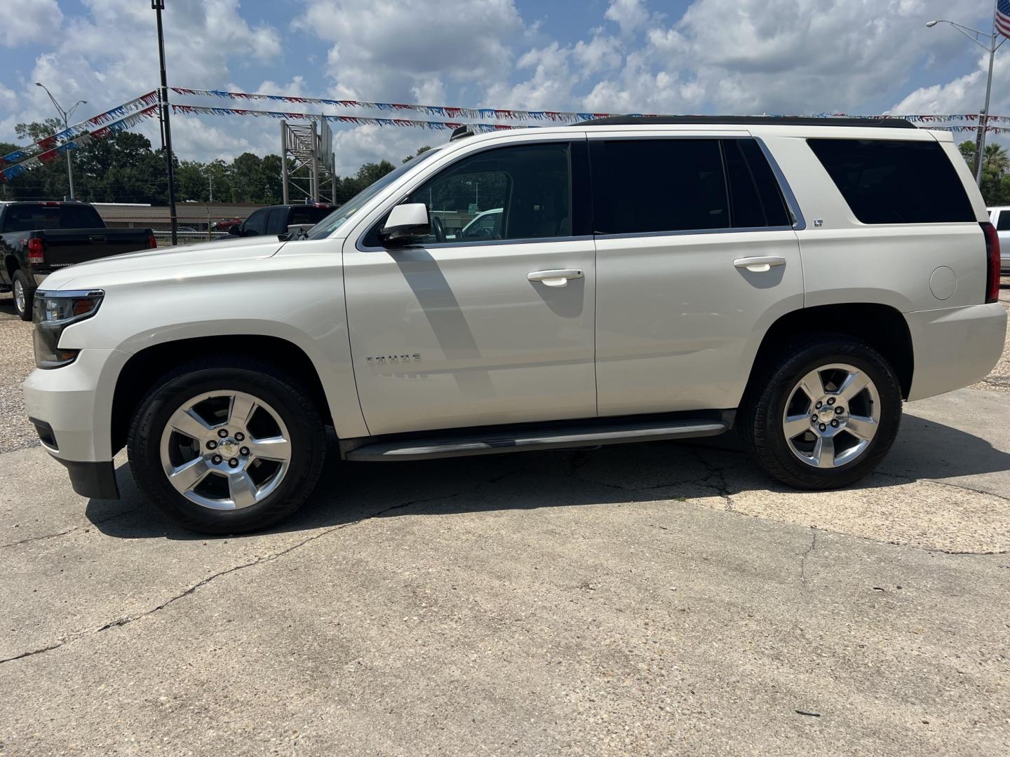 2015 White /Tan Chevrolet Tahoe LT (1GNSCBKC0FR) with an 5.3L V8 engine, 6-Speed Automatic transmission, located at 4520 Airline Hwy, Baton Rouge, LA, 70805, (225) 357-1497, 30.509325, -91.145432 - 2015 Chevrolet Tahoe LT 2WD 5.3 V8 Gas, 162K Miles, Heated Leather Interior, Seats 7, Cold A/C, All Power, Rear Camera, 20" Alloy Wheels, Tow Package. FOR INFO PLEASE CONTACT JEFF AT 225-413-0981. CHECK OUT OUR A+ RATING WITH THE BETTER BUSINESS BUREAU. WE HAVE BEEN A FAMILY OWNED AND OPERATED BUSI- Photo#1