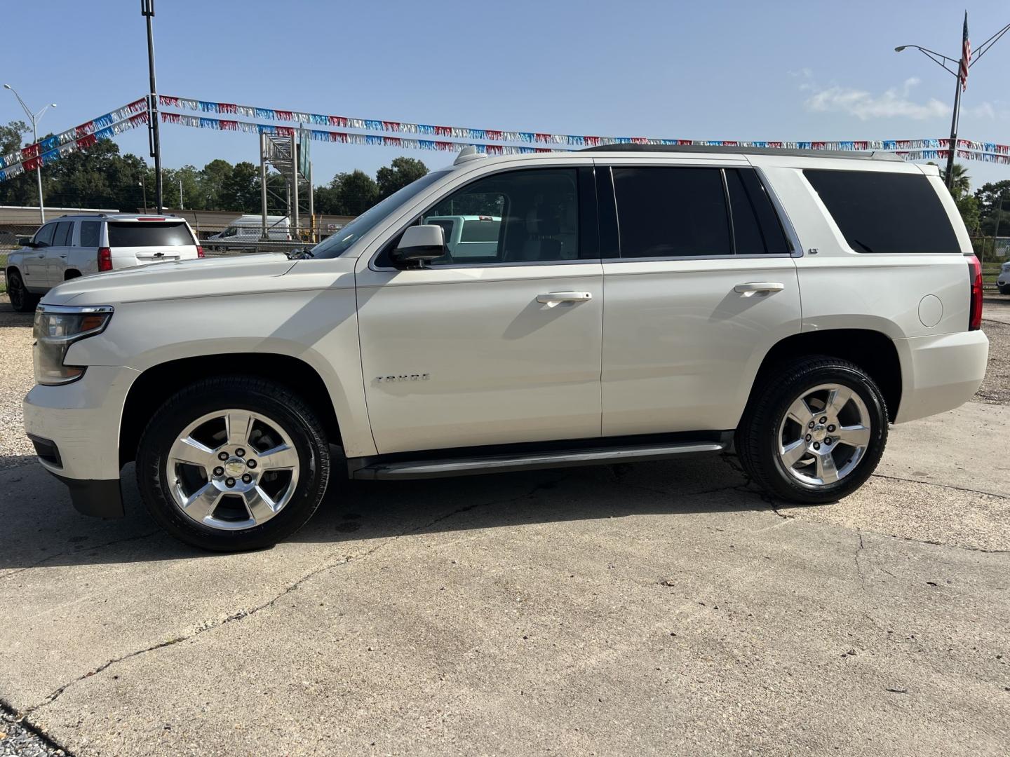 2015 White Diamond /Tan Chevrolet Tahoe LT (1GNSCBKC1FR) with an 5.3L V8 engine, 6-Speed Automatic transmission, located at 4520 Airline Hwy, Baton Rouge, LA, 70805, (225) 357-1497, 30.509325, -91.145432 - 2015 Chevrolet Tahoe LT **ONE OWNER & NO ACCIDENTS** 5.3 V8 Gas, 198K Miles, Leather Seats, Cold A/C, All Power, Bose Stereo, Seats 7, New Tires, Tow Package. FOR INFO PLEASE CONTACT JEFF AT 225-413-0981. CHECK OUT OUR A+ RATING WITH THE BETTER BUSINESS BUREAU. WE HAVE BEEN A FAMILY OWNED AND OPERA- Photo#1